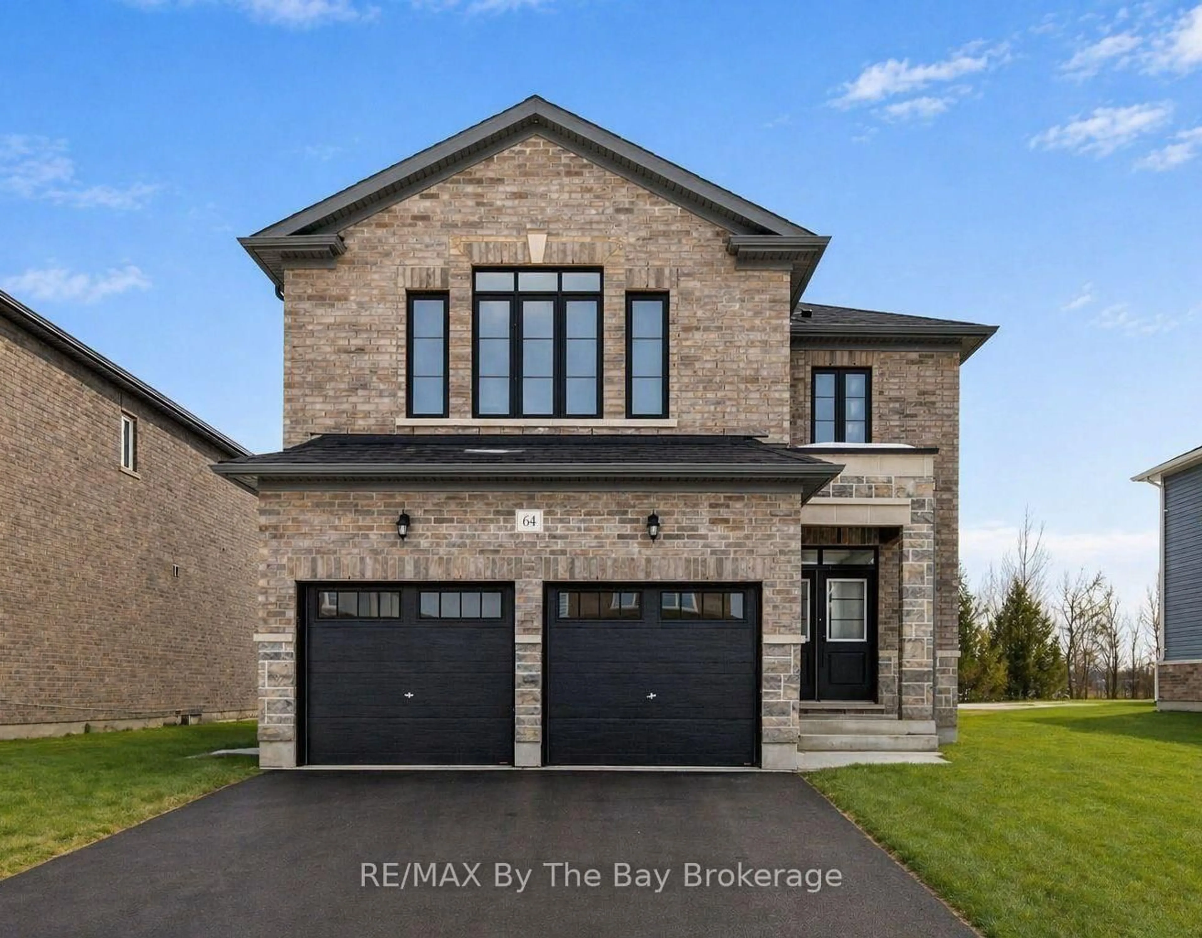 Home with brick exterior material, street for 64 Amber Dr, Wasaga Beach Ontario L9Z 0R9