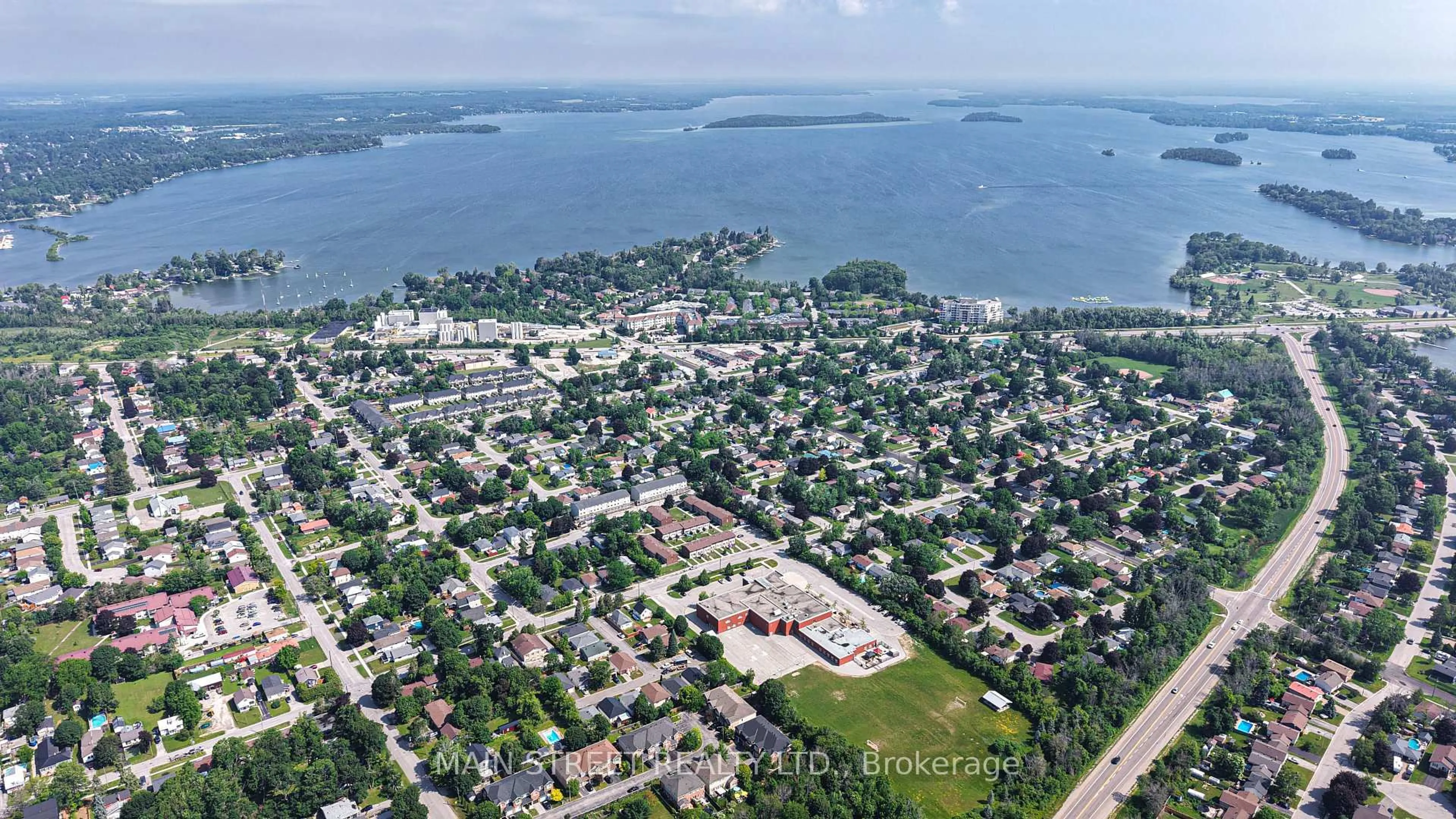 A pic from outside/outdoor area/front of a property/back of a property/a pic from drone, water/lake/river/ocean view for 231 OXFORD St #2, Orillia Ontario L3V 7S6