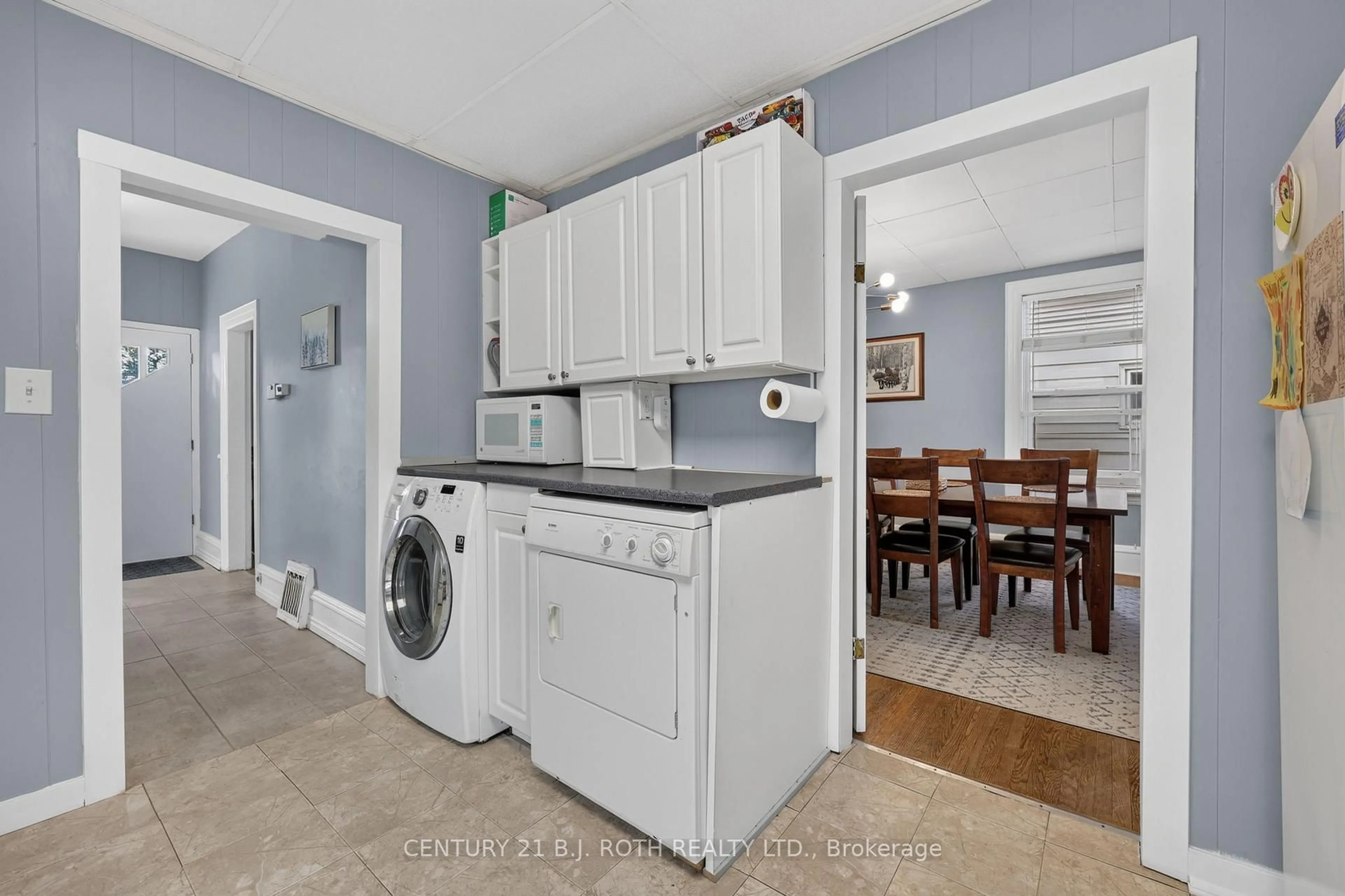Kitchen with laundary machines, unknown for 232 Mary St, Orillia Ontario L3V 7Y7