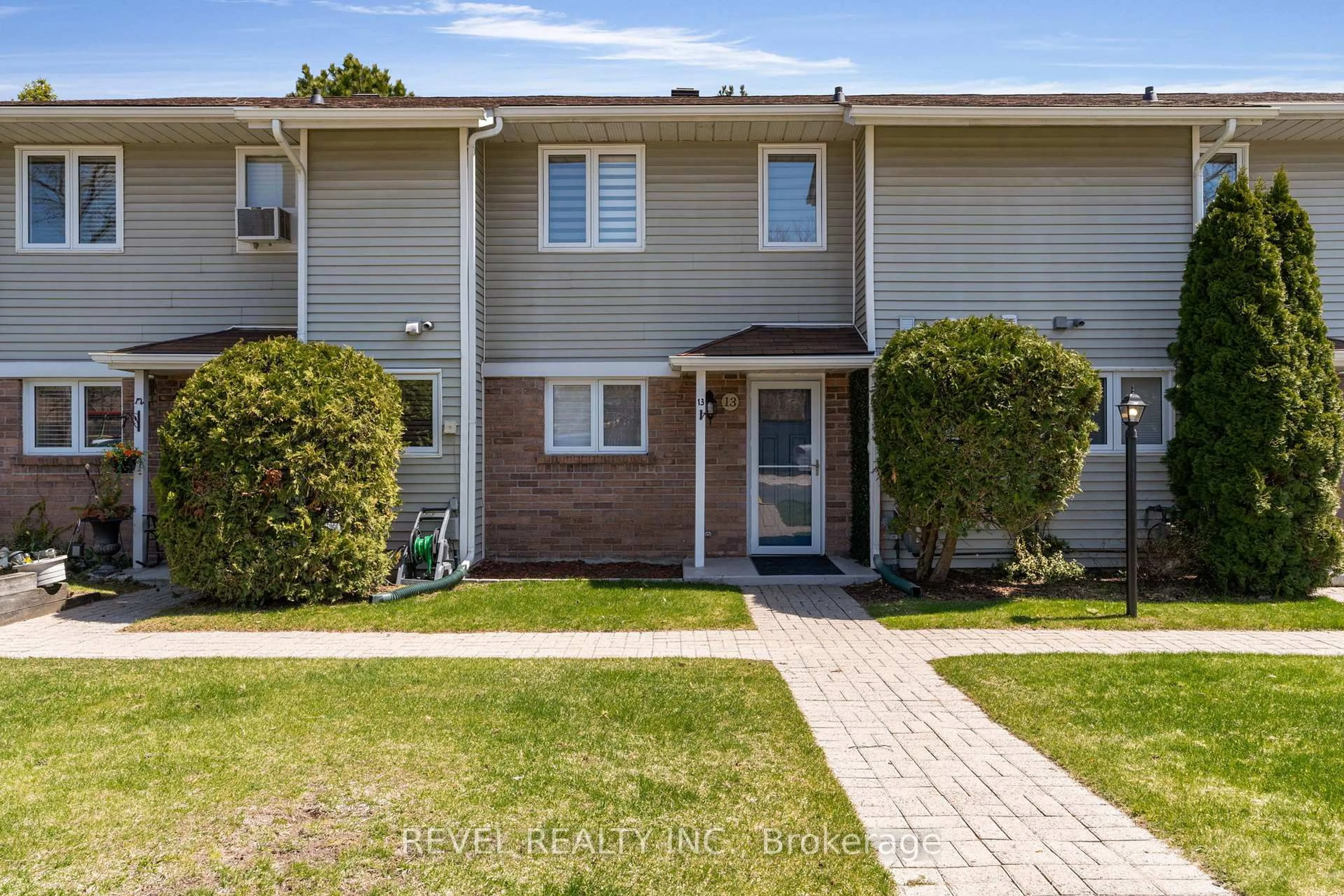A pic from outside/outdoor area/front of a property/back of a property/a pic from drone, street for 39 28th St #13, Wasaga Beach Ontario L9Z 2E4