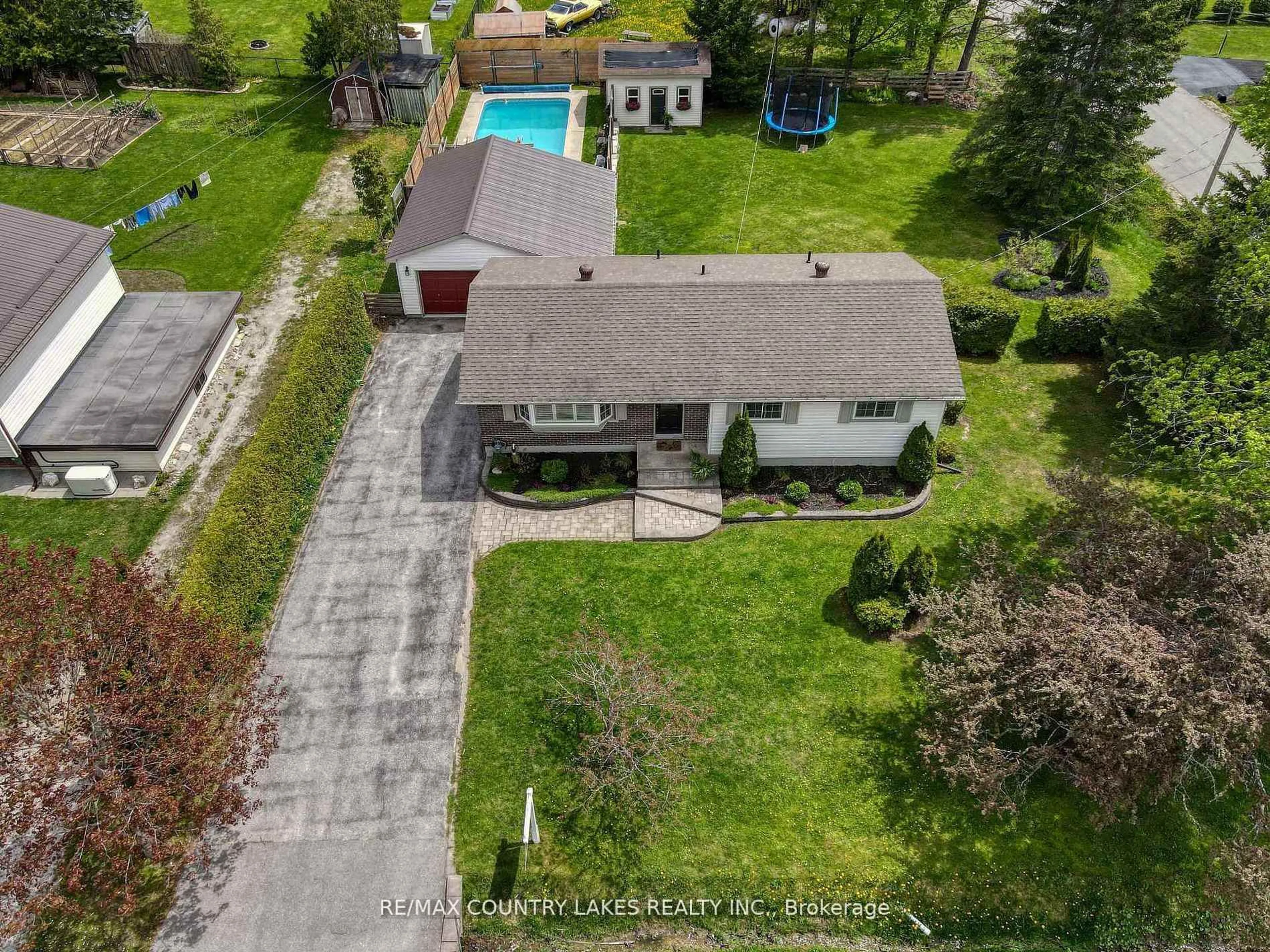 A pic from outside/outdoor area/front of a property/back of a property/a pic from drone, street for 1 Price Dr, Oro-Medonte Ontario L3V 6H2