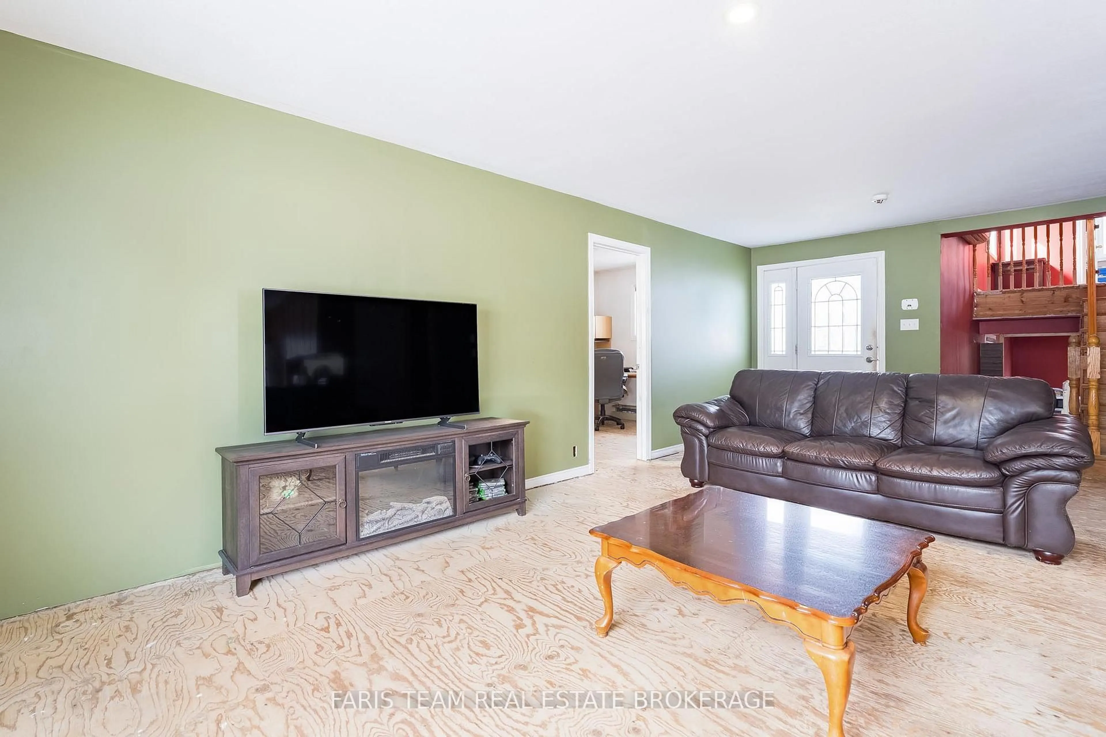 Living room with furniture, unknown for 1008 Rainbow Valley Rd, Springwater Ontario L0L 2K0