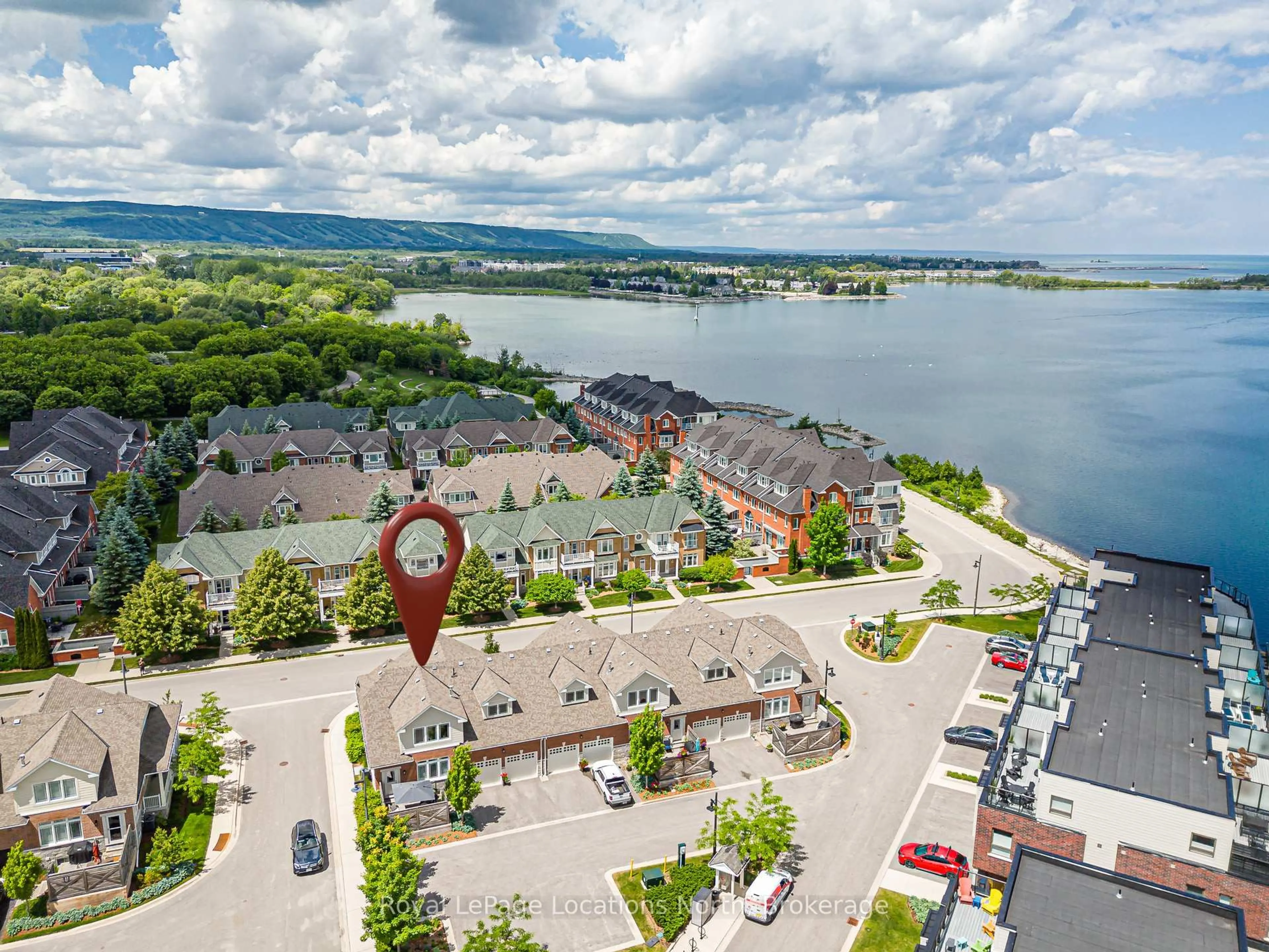 A pic from outside/outdoor area/front of a property/back of a property/a pic from drone, water/lake/river/ocean view for 11 North Pine St, Collingwood Ontario L9Y 5L6
