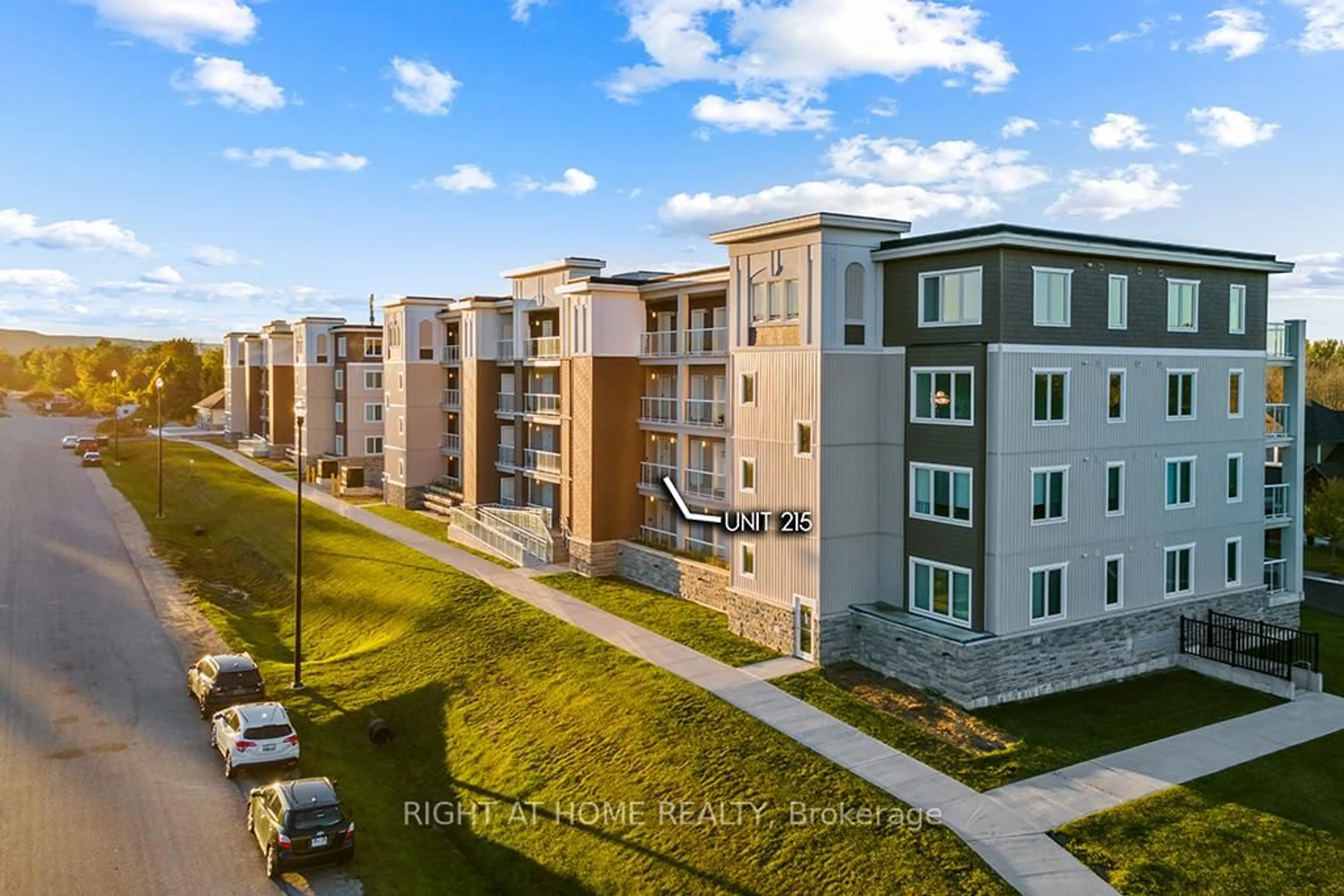 A pic from outside/outdoor area/front of a property/back of a property/a pic from drone, city buildings view from balcony for 5 Spooner Cres #215, Collingwood Ontario L9Y 1T3