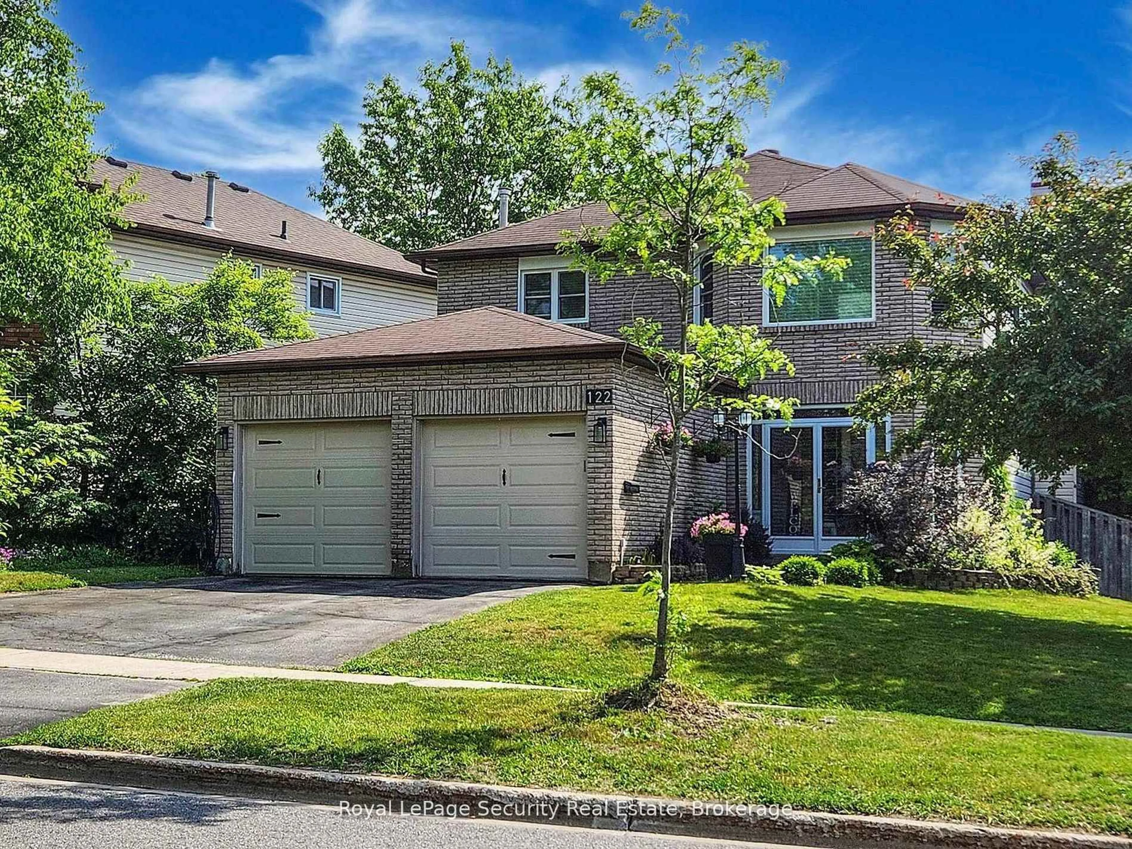 Home with brick exterior material, street for 122 Browning Tr, Barrie Ontario L4N 6R3