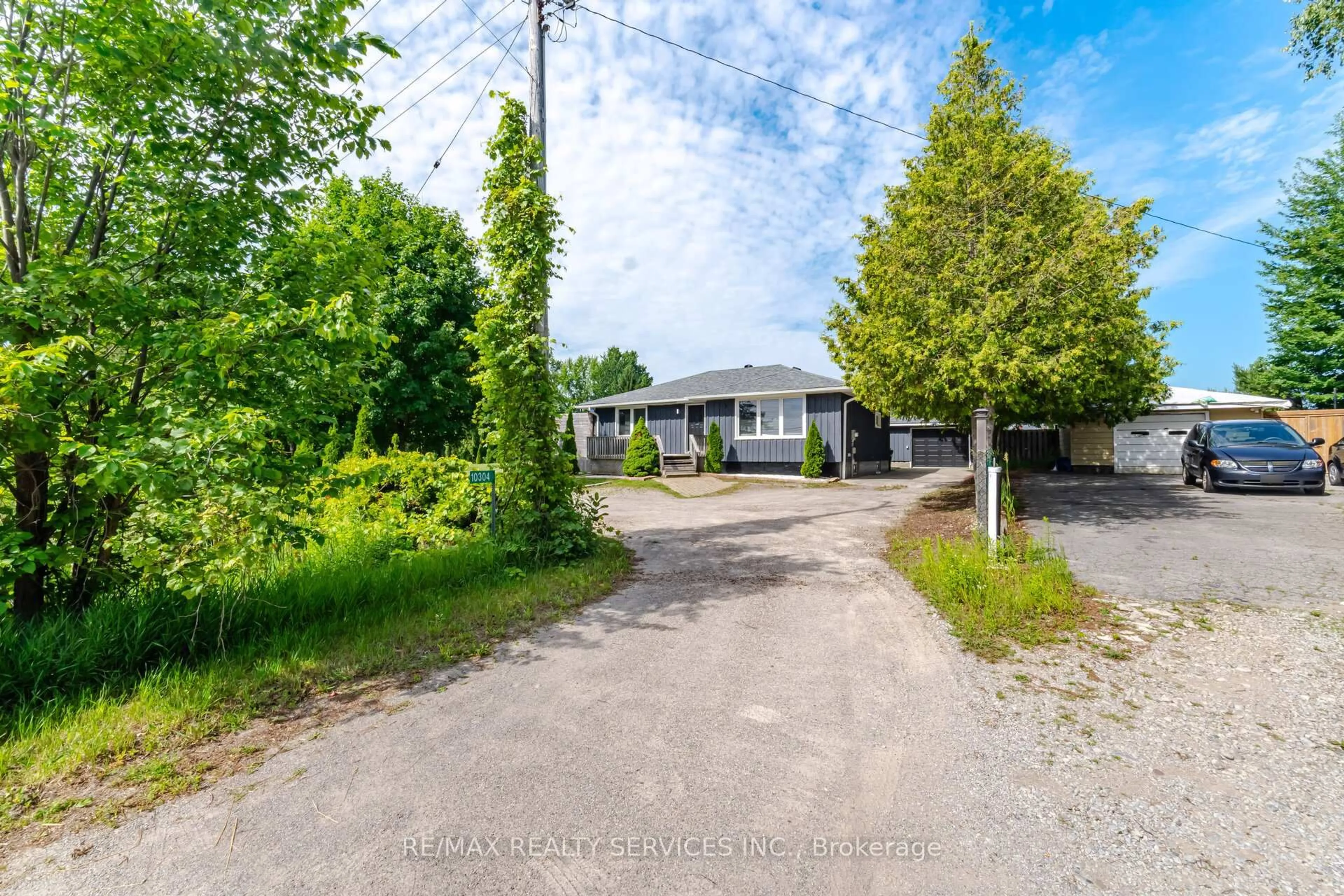 A pic from outside/outdoor area/front of a property/back of a property/a pic from drone, street for 10304 County Road 10 Rd, Clearview Ontario L0M 1N0