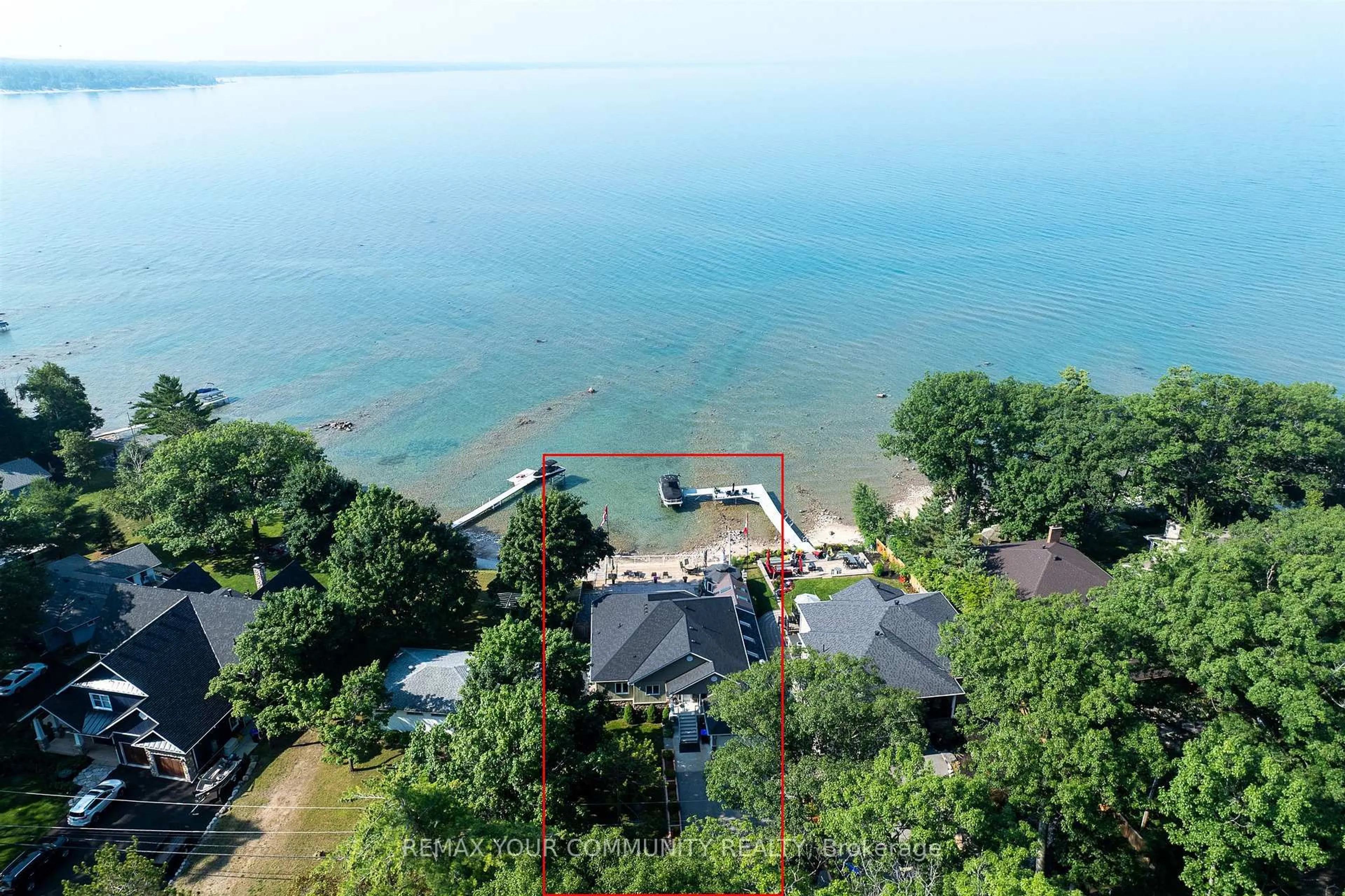 A pic from outside/outdoor area/front of a property/back of a property/a pic from drone, water/lake/river/ocean view for 1834 Tiny Beaches Rd, Tiny Ontario L0L 1P1