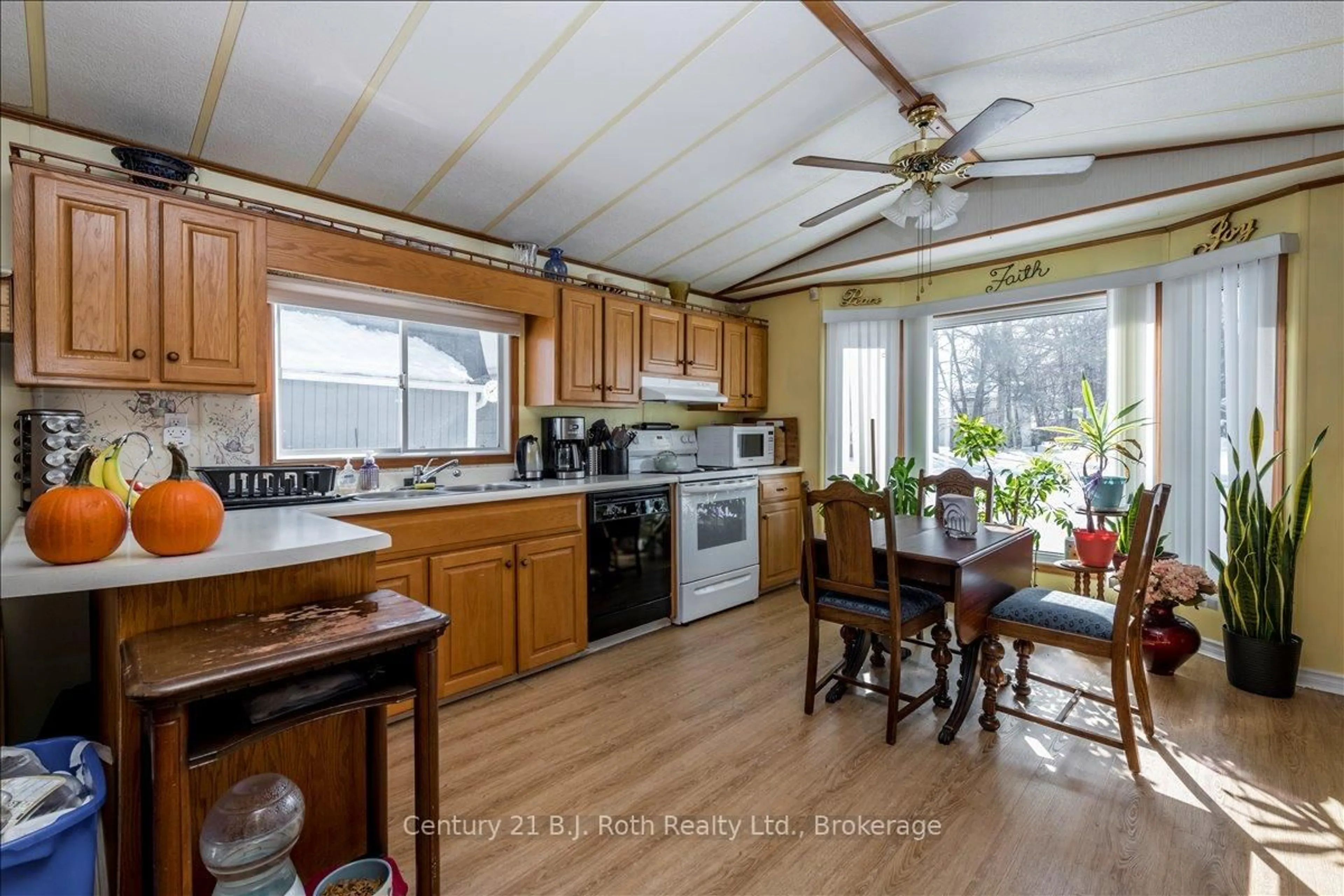 Open concept kitchen, wood/laminate floor for 1 Smiths Lane, Midland Ontario L4R 0B9