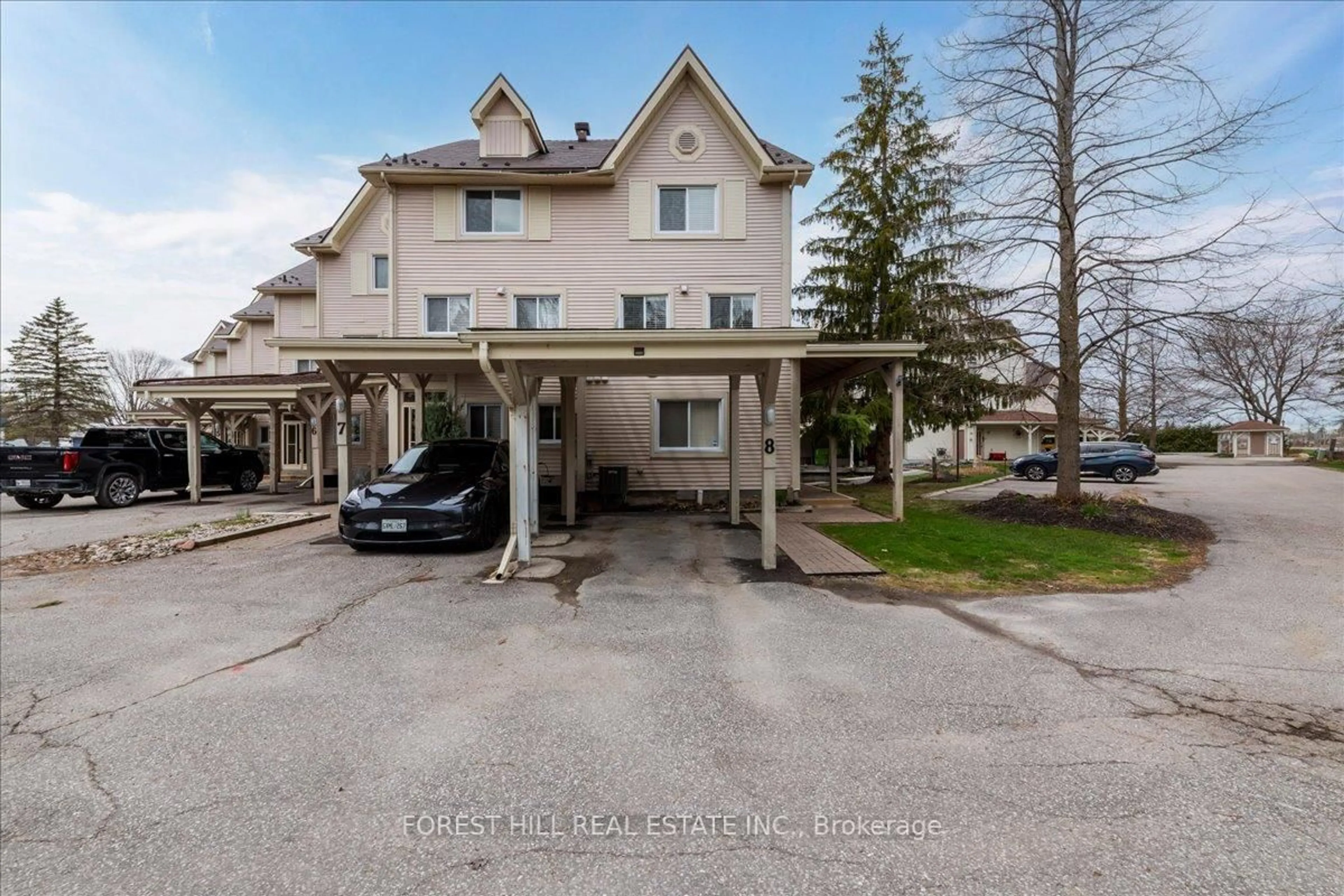 A pic from outside/outdoor area/front of a property/back of a property/a pic from drone, street for 100 Laguna Pkwy #8, Ramara Ontario L0K 1B0