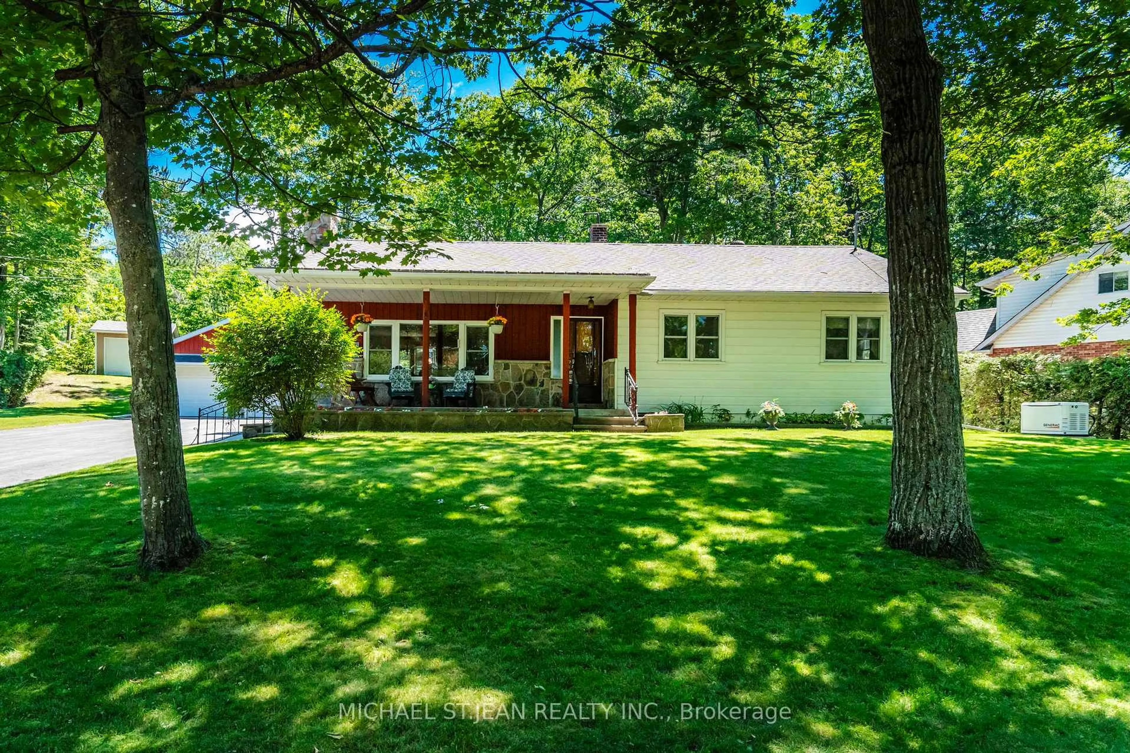 A pic from outside/outdoor area/front of a property/back of a property/a pic from drone, unknown for 223 Tiny Beaches Rd, Tiny Ontario L0L 2J0