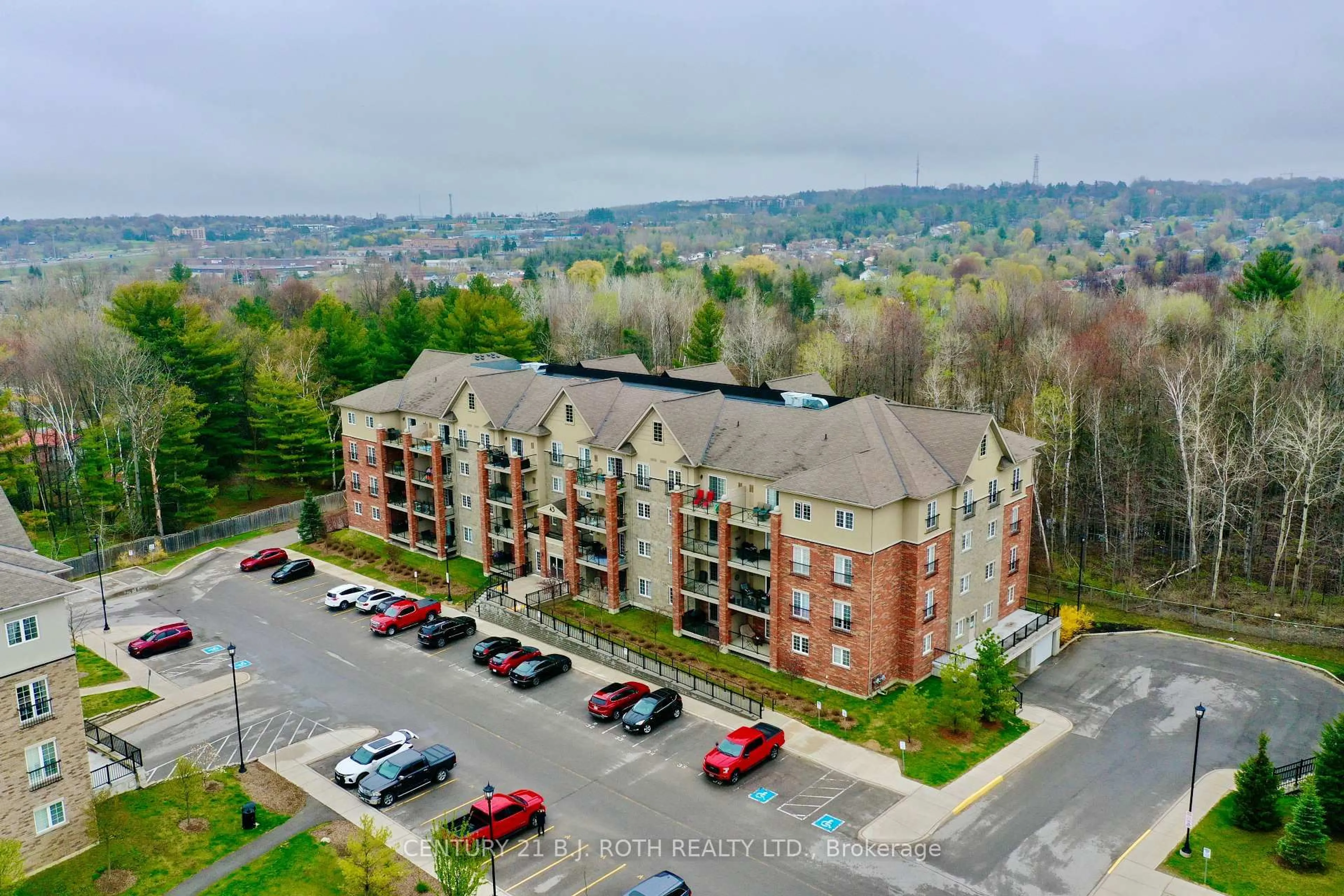 A pic from outside/outdoor area/front of a property/back of a property/a pic from drone, unknown for 43 Ferndale Dr #104, Barrie Ontario L4N 5W6