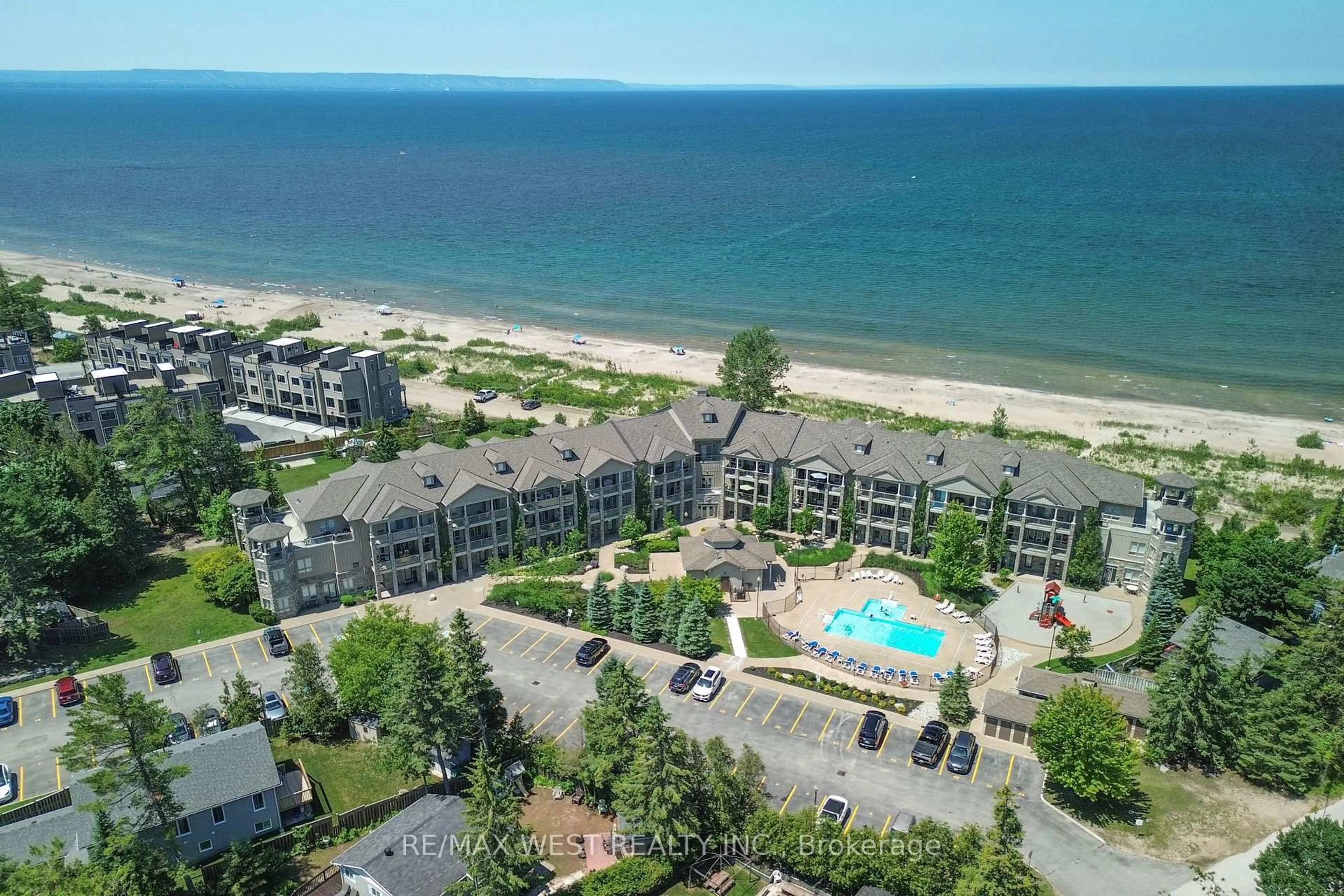 A pic from outside/outdoor area/front of a property/back of a property/a pic from drone, water/lake/river/ocean view for 764 RIVER Rd #212, Wasaga Beach Ontario L9Z 2M7