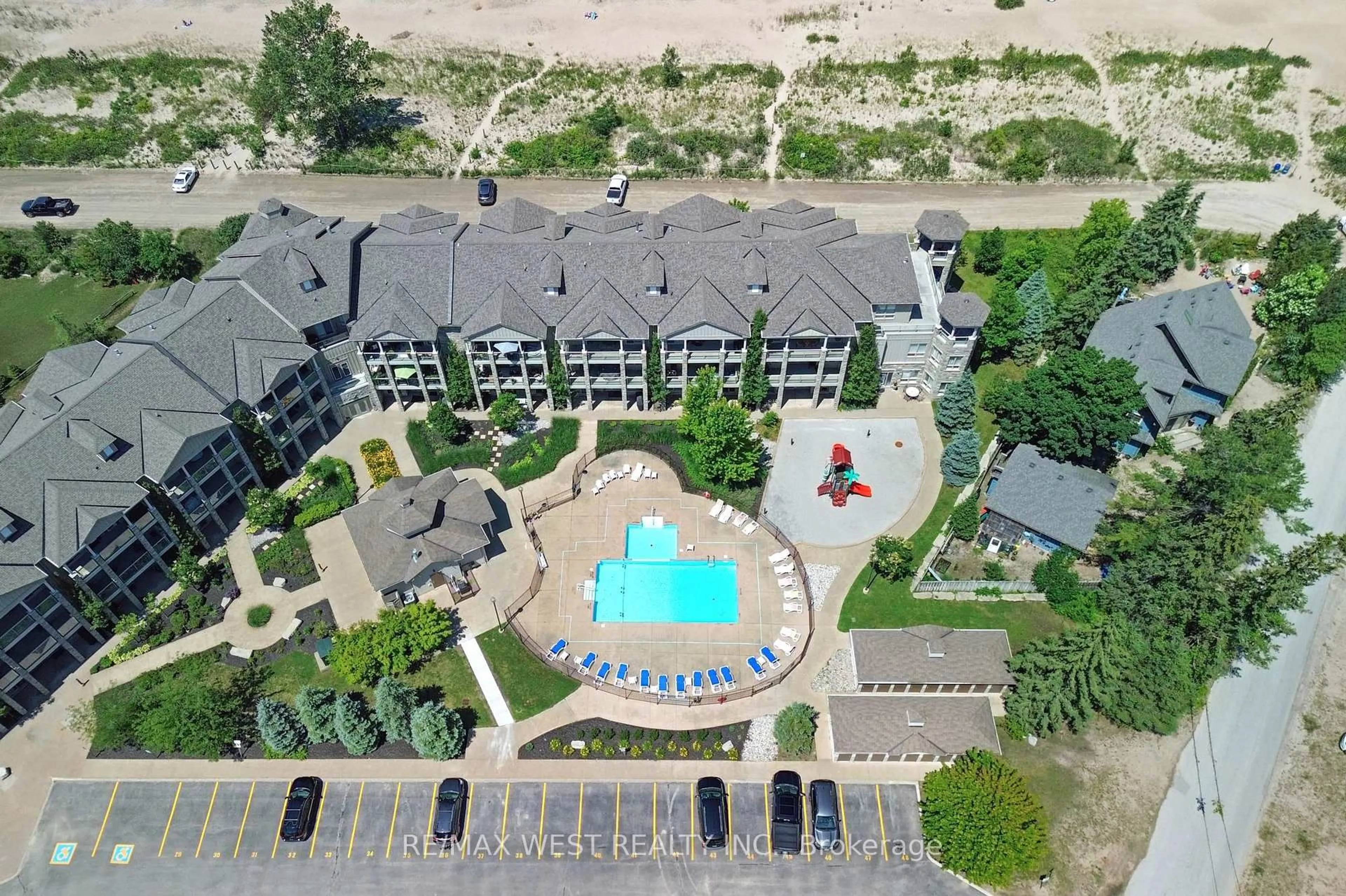 A pic from outside/outdoor area/front of a property/back of a property/a pic from drone, unknown for 764 RIVER Rd #212, Wasaga Beach Ontario L9Z 2M7