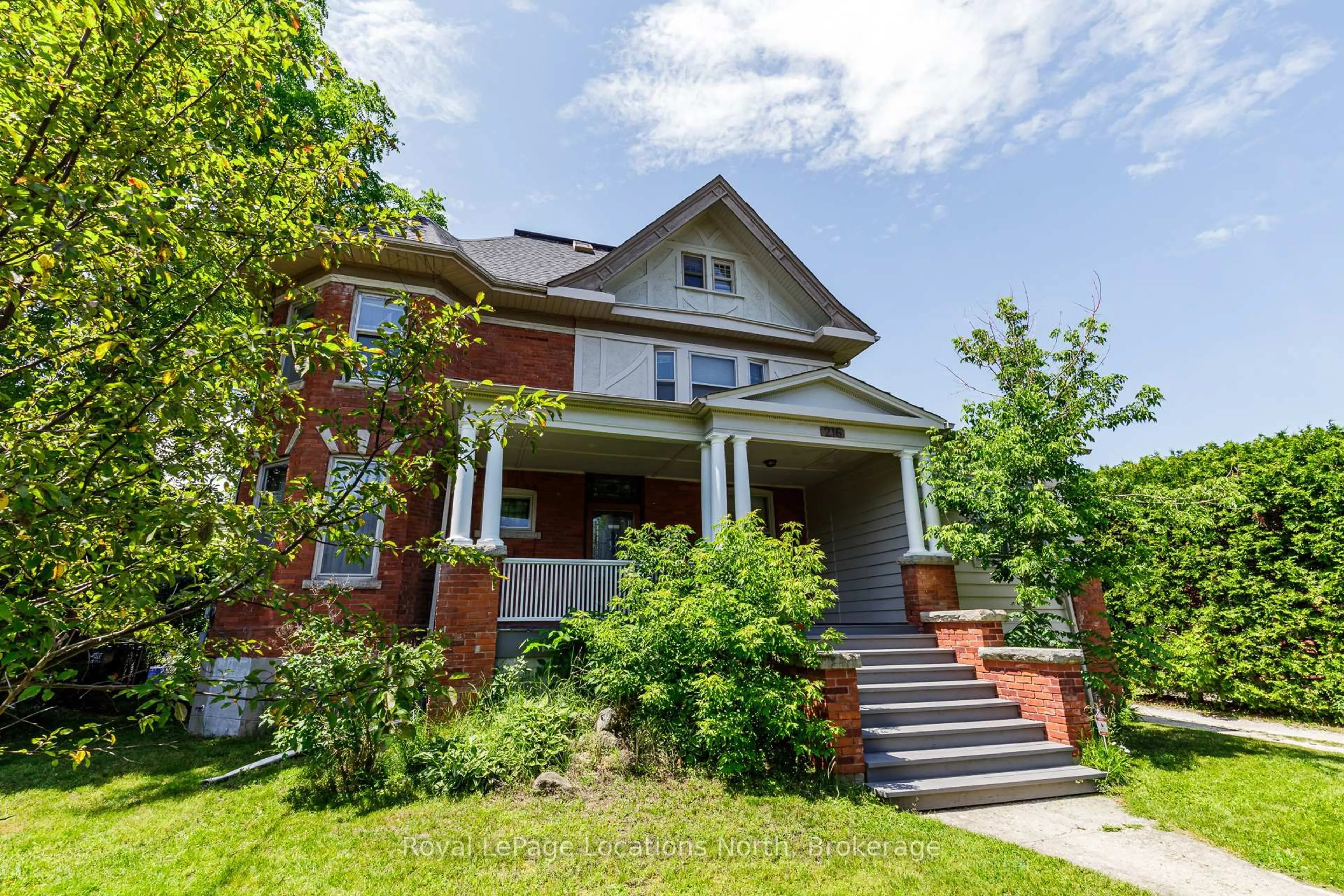 Home with brick exterior material, street for 216 Cedar St, Collingwood Ontario L9Y 3A8