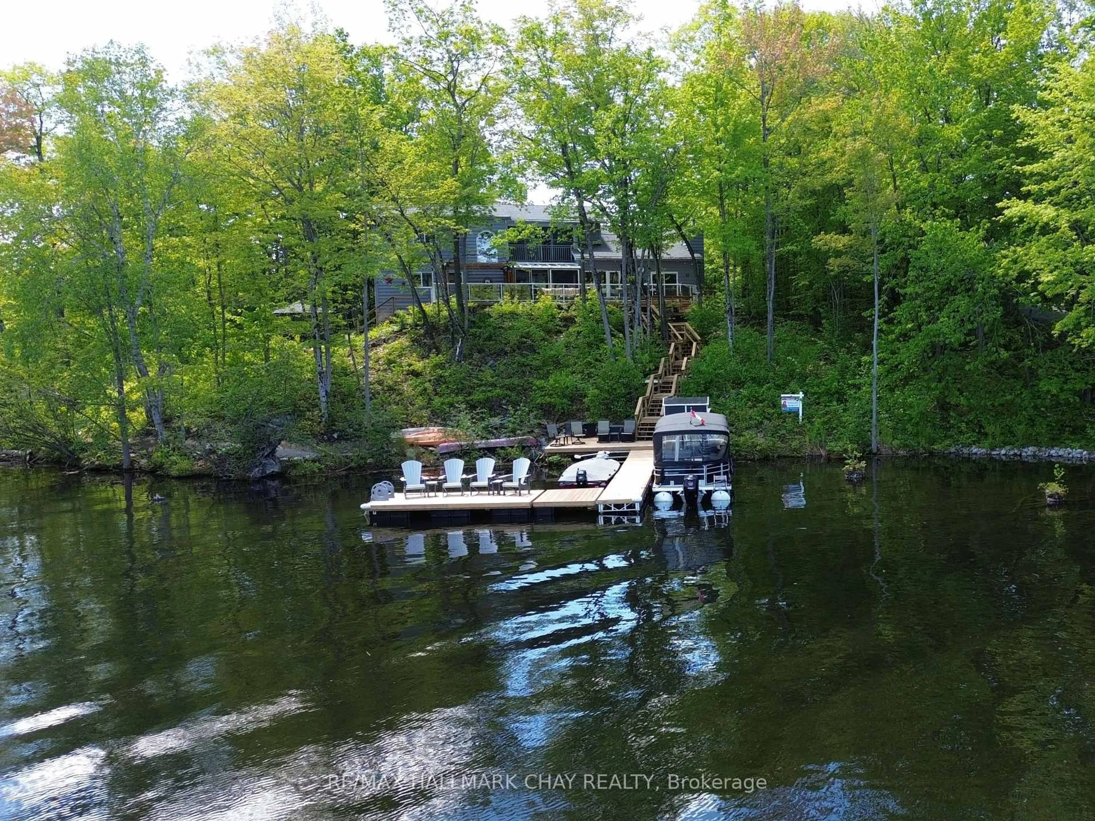A pic from outside/outdoor area/front of a property/back of a property/a pic from drone, water/lake/river/ocean view for 3285 Rockcliffe Crt, Severn Ontario L0K 1S0