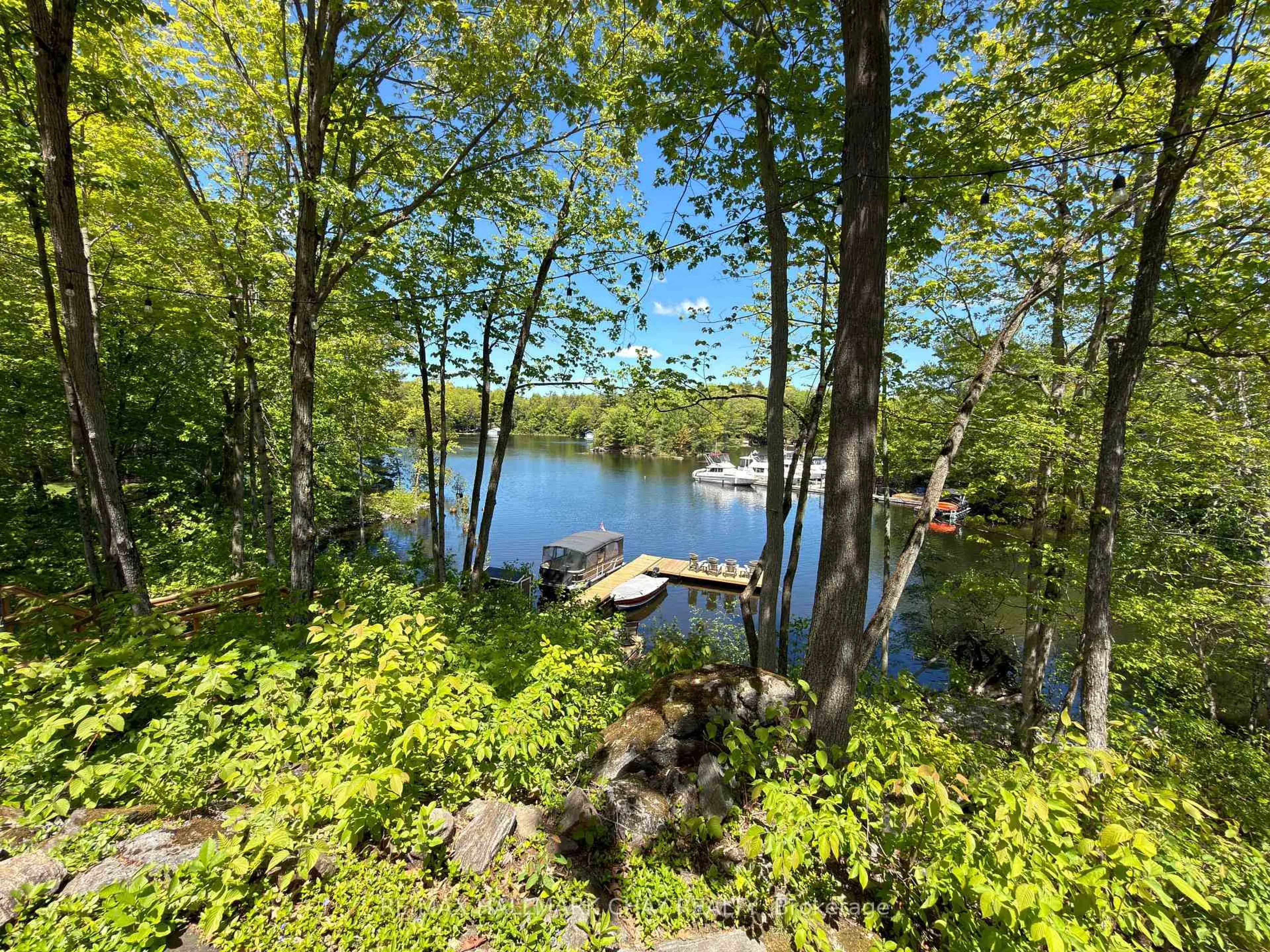 A pic from outside/outdoor area/front of a property/back of a property/a pic from drone, water/lake/river/ocean view for 3285 Rockcliffe Crt, Severn Ontario L0K 1S0
