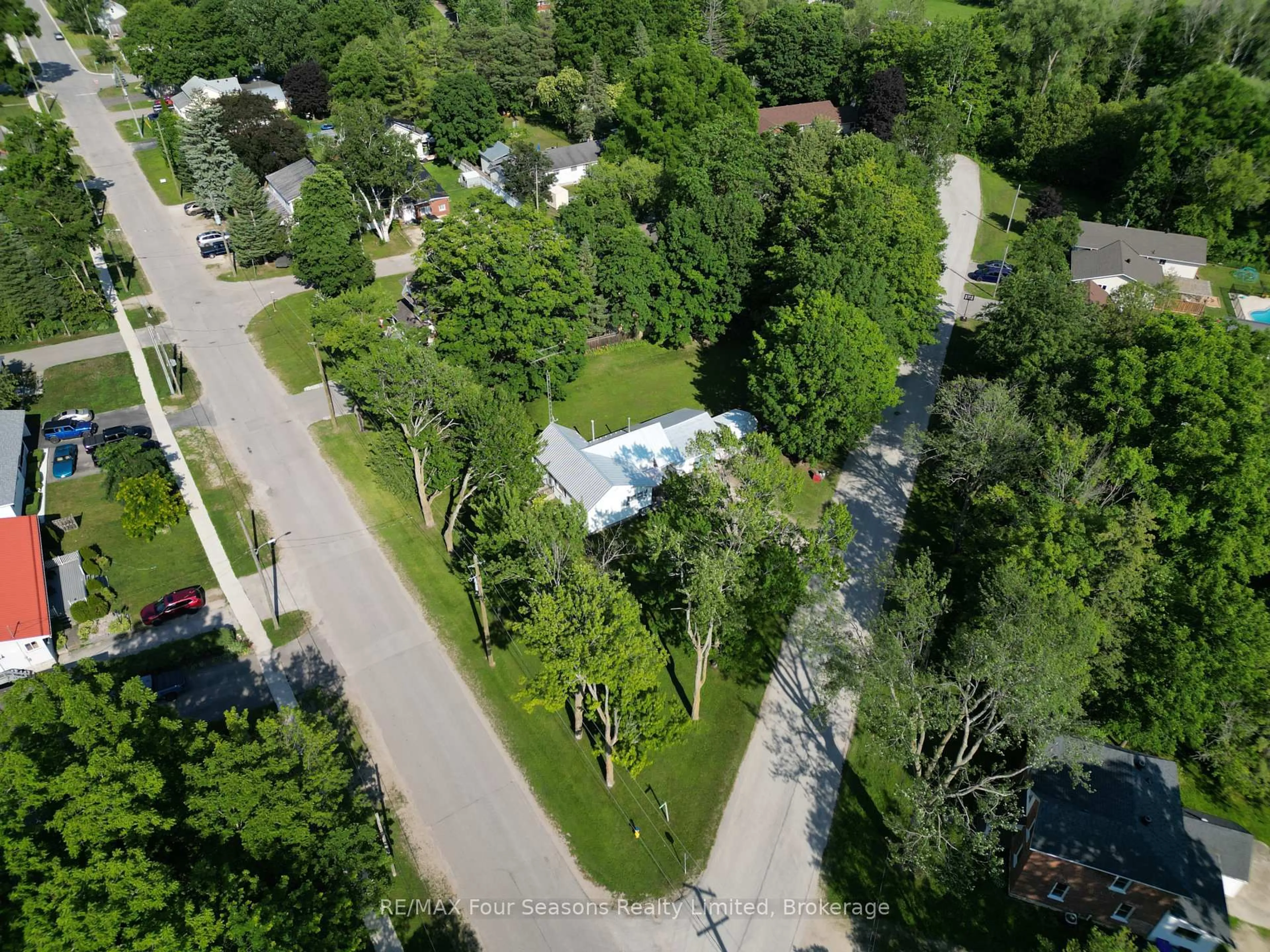 A pic from outside/outdoor area/front of a property/back of a property/a pic from drone, forest/trees view for 201 Sunnidale St, Clearview Ontario L0M 1S0