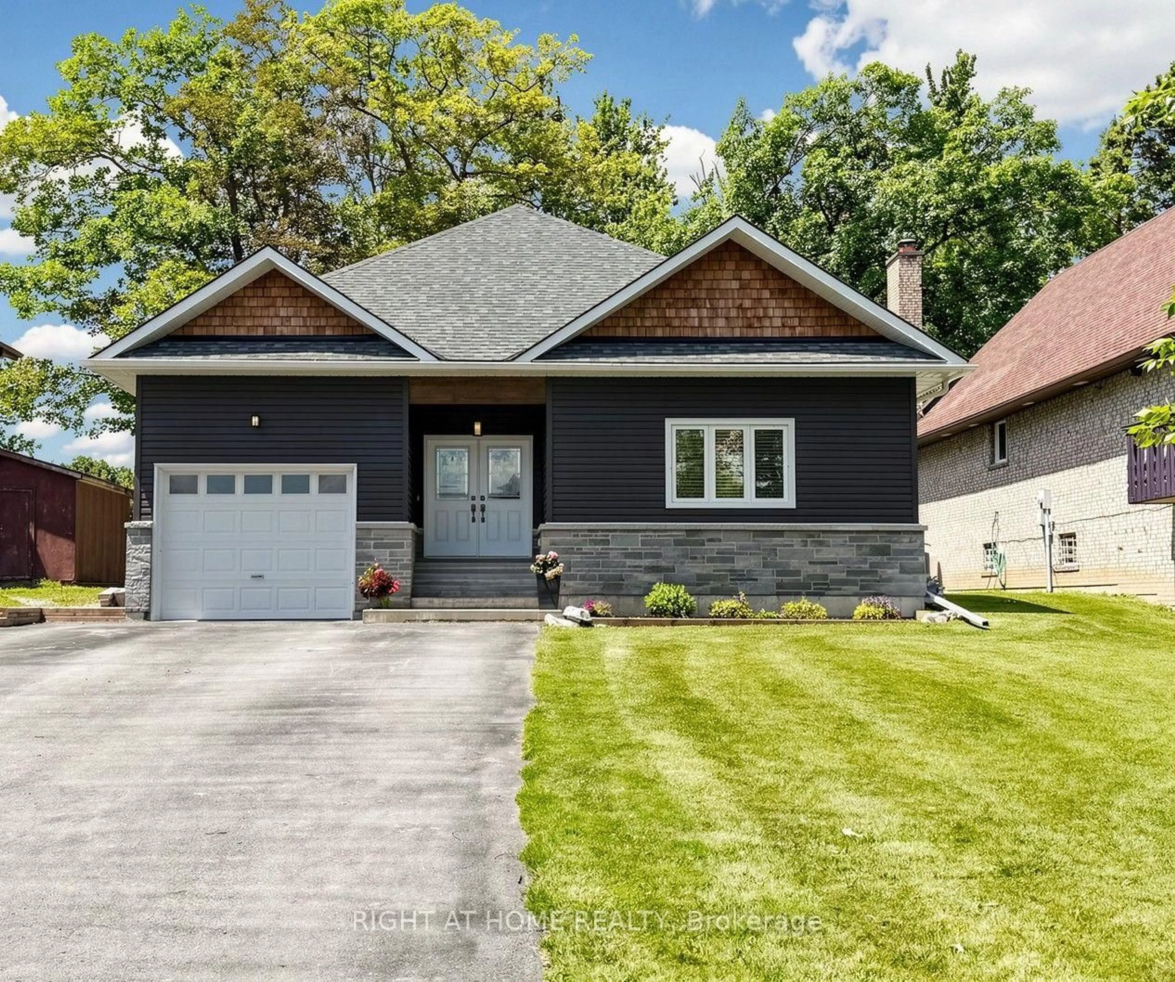 Home with brick exterior material, street for 48 Ridge Ave, Ramara Ontario L0K 1B0