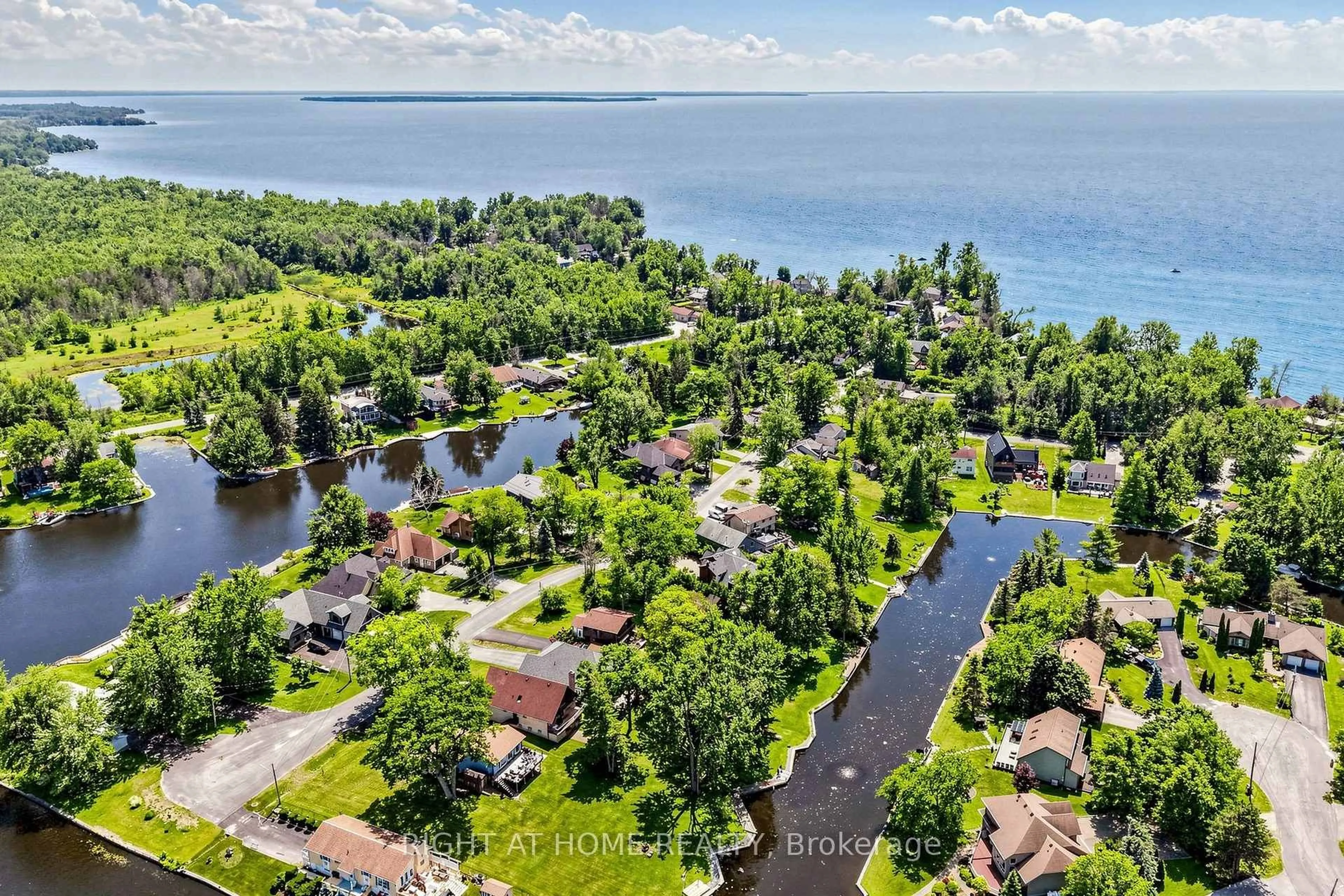 A pic from outside/outdoor area/front of a property/back of a property/a pic from drone, water/lake/river/ocean view for 48 Ridge Ave, Ramara Ontario L0K 1B0