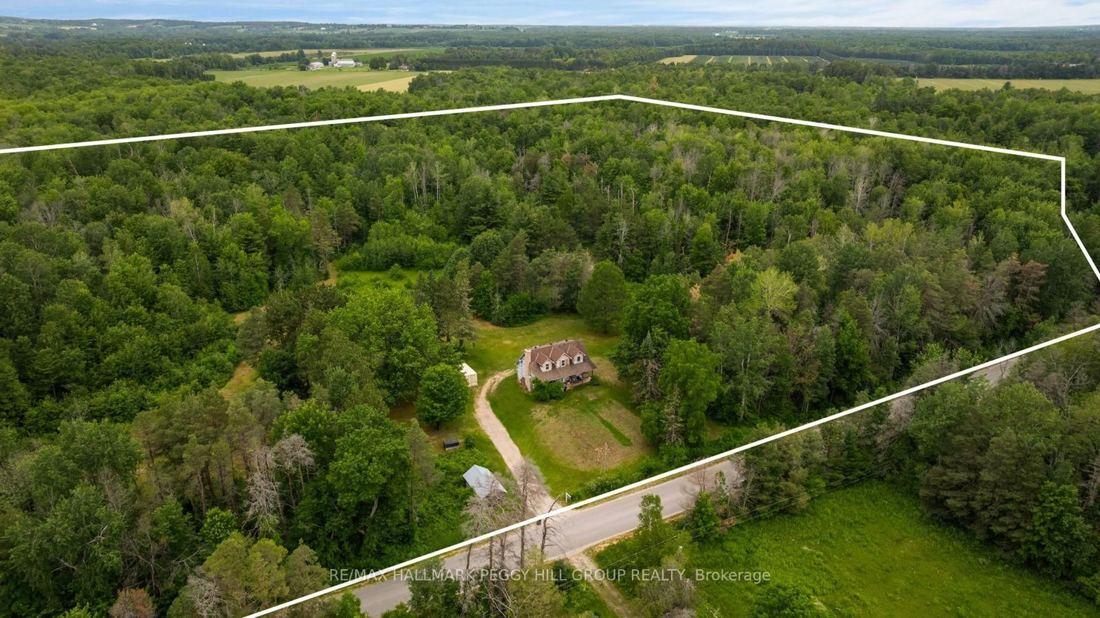 A pic from outside/outdoor area/front of a property/back of a property/a pic from drone, forest/trees view for 3664 Hogback Rd, Clearview Ontario L0M 1N0