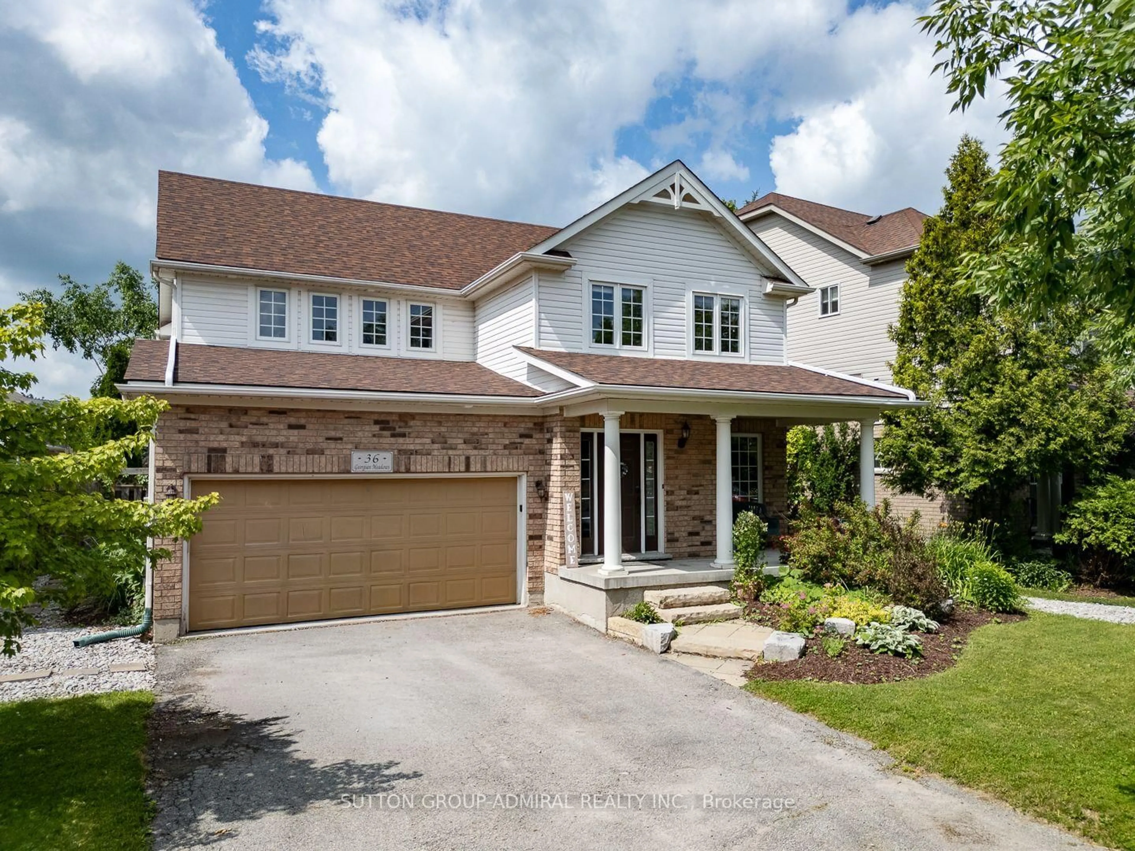 Home with brick exterior material, street for 36 Georgian Meadows Dr, Collingwood Ontario L9Y 5H2