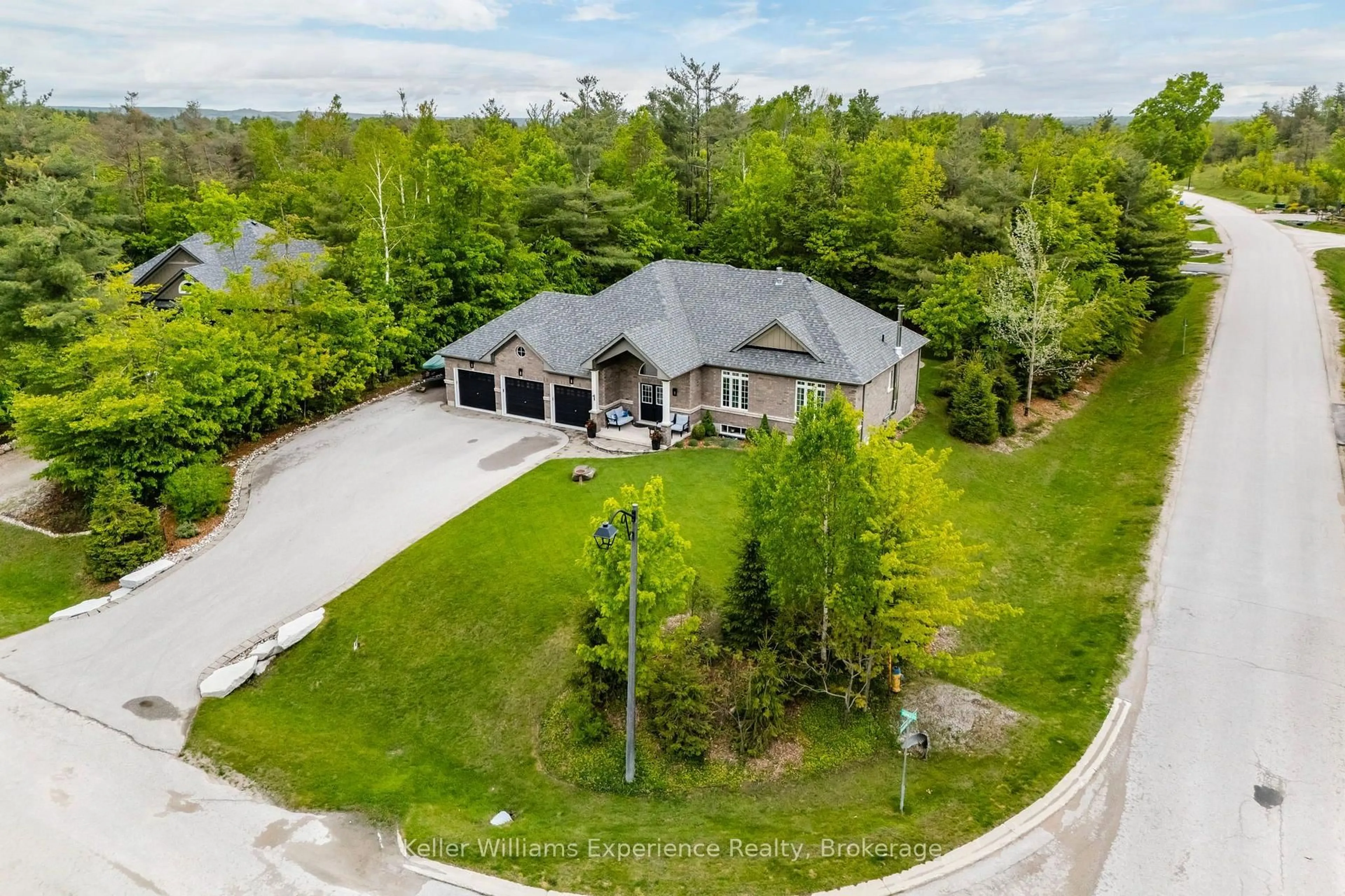 A pic from outside/outdoor area/front of a property/back of a property/a pic from drone, water/lake/river/ocean view for 1 Topaz Crt, Oro-Medonte Ontario L0L 2E0