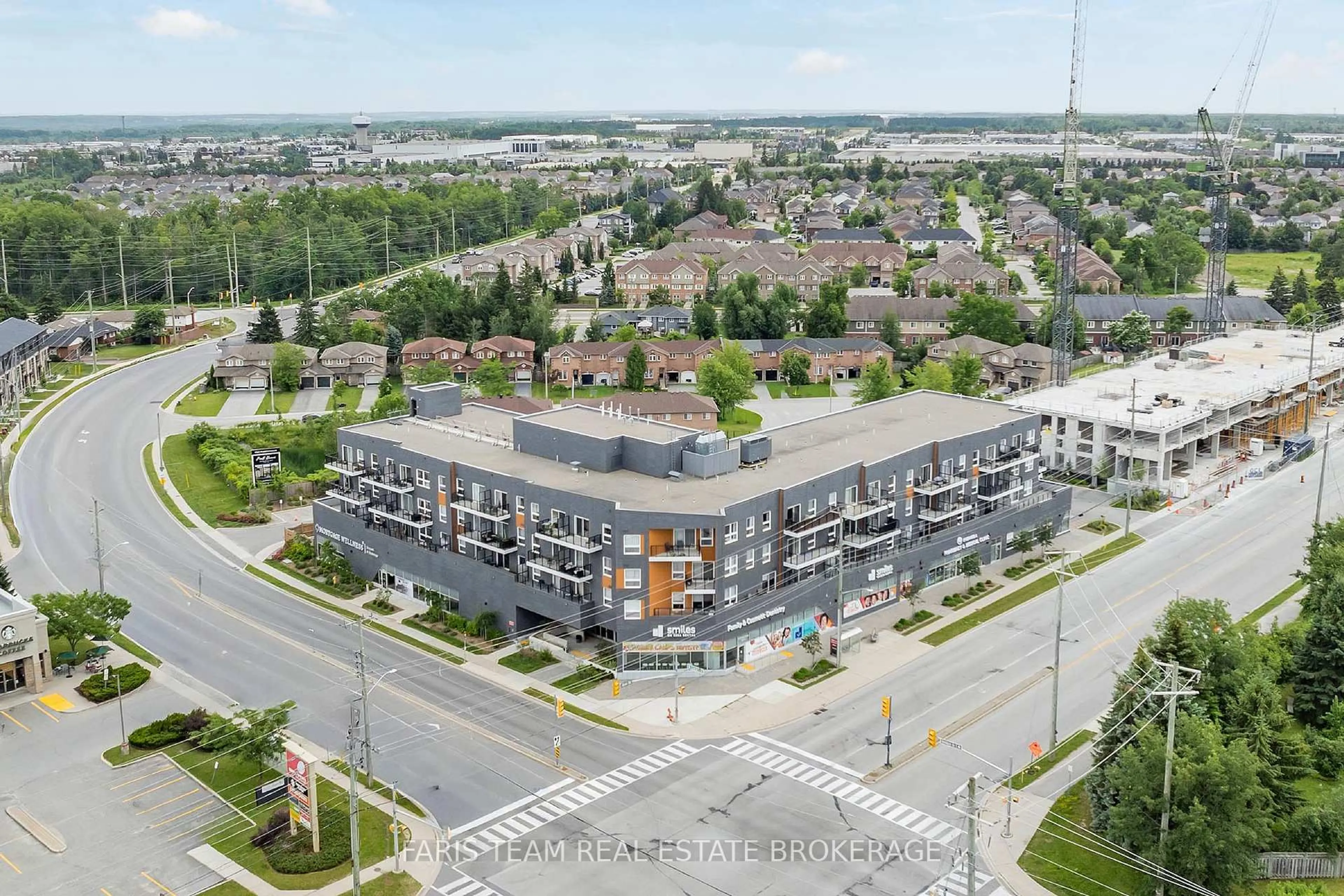 A pic from outside/outdoor area/front of a property/back of a property/a pic from drone, unknown for 430 Essa Rd #401, Barrie Ontario L9J 0M1