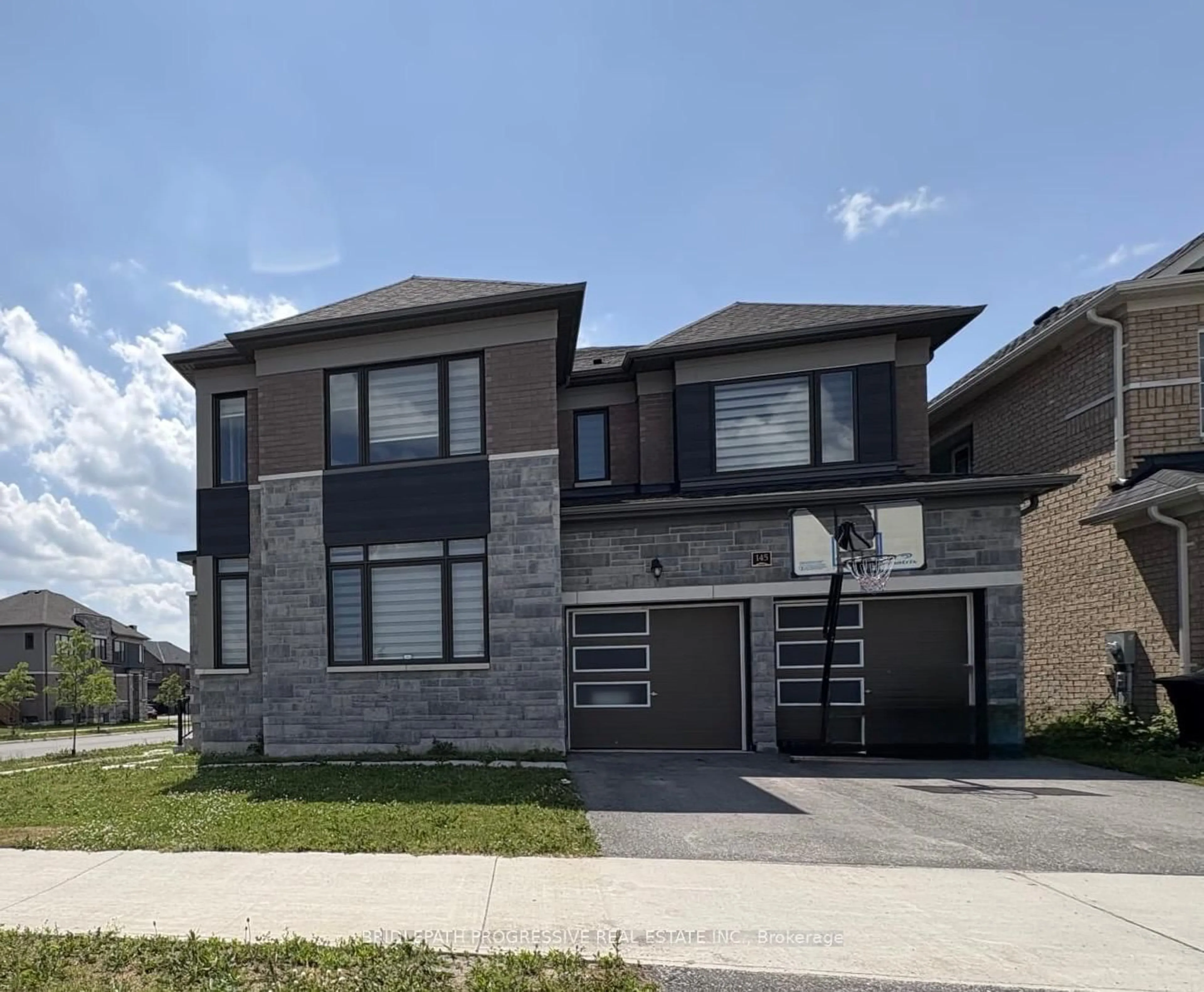 Home with brick exterior material, street for 145 Terry Fox Dr, Barrie Ontario L9J 0L9