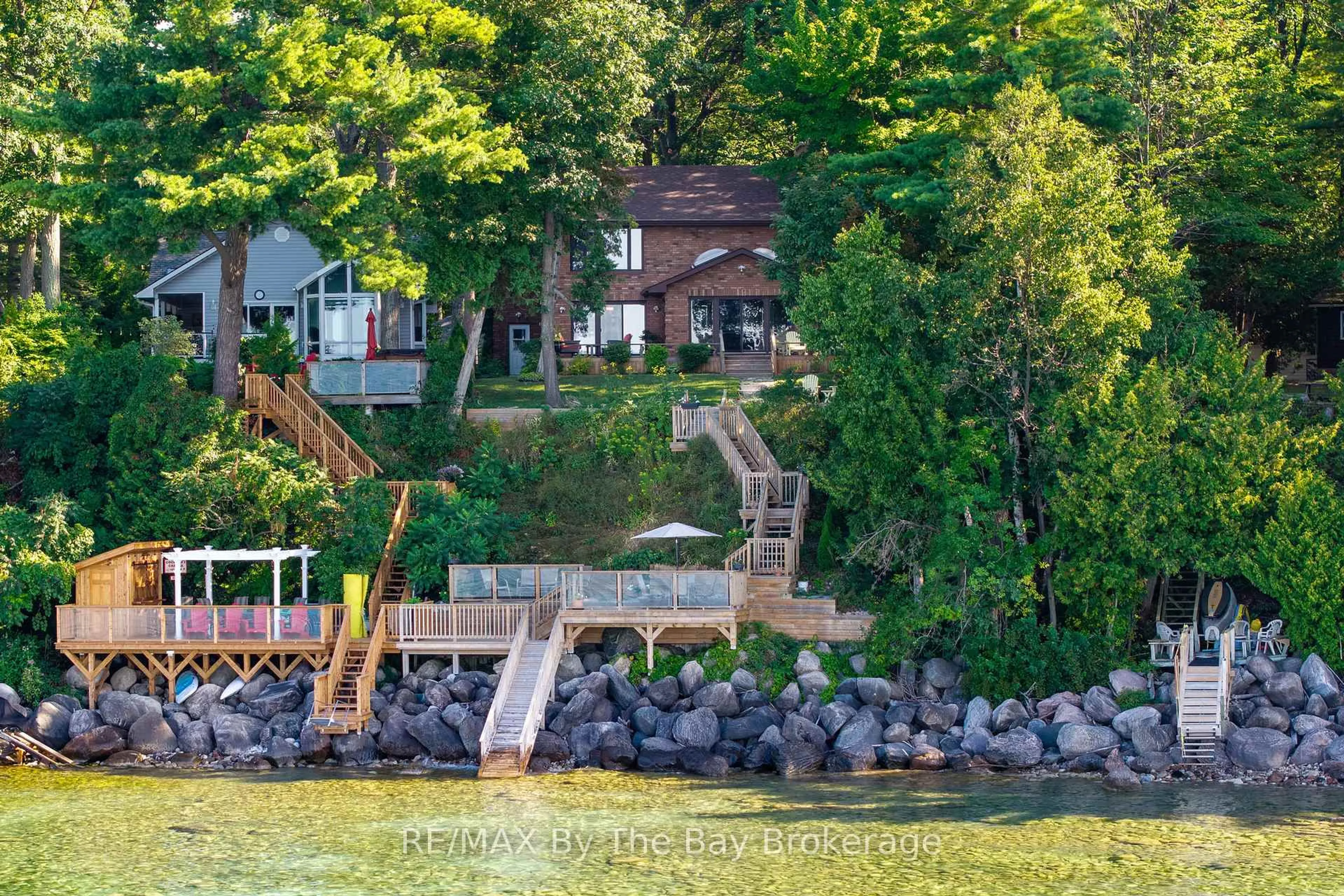 A pic from outside/outdoor area/front of a property/back of a property/a pic from drone, water/lake/river/ocean view for 38 Willow Dr, Tiny Ontario L0L 1P1