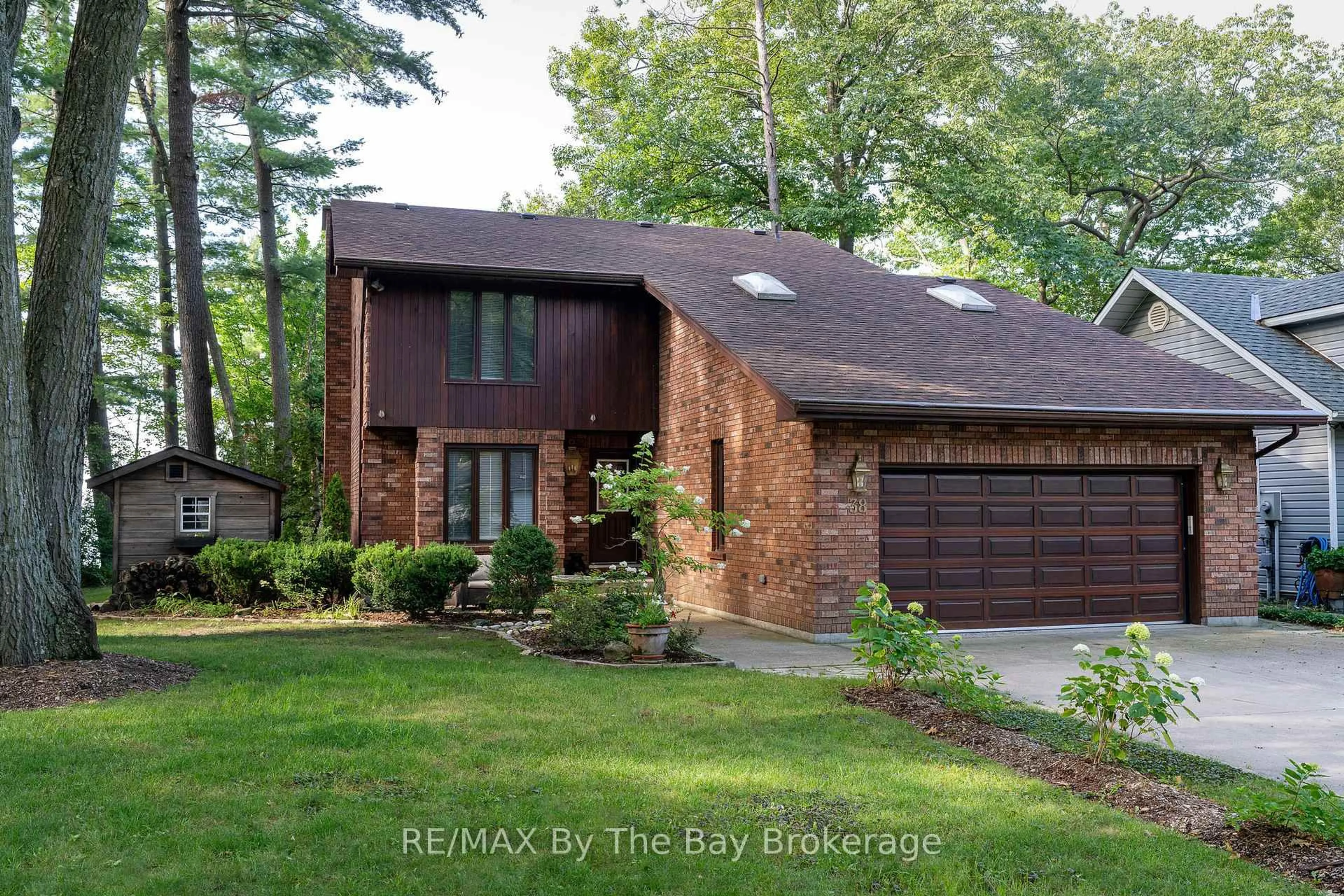 Home with brick exterior material, street for 38 Willow Dr, Tiny Ontario L0L 1P1