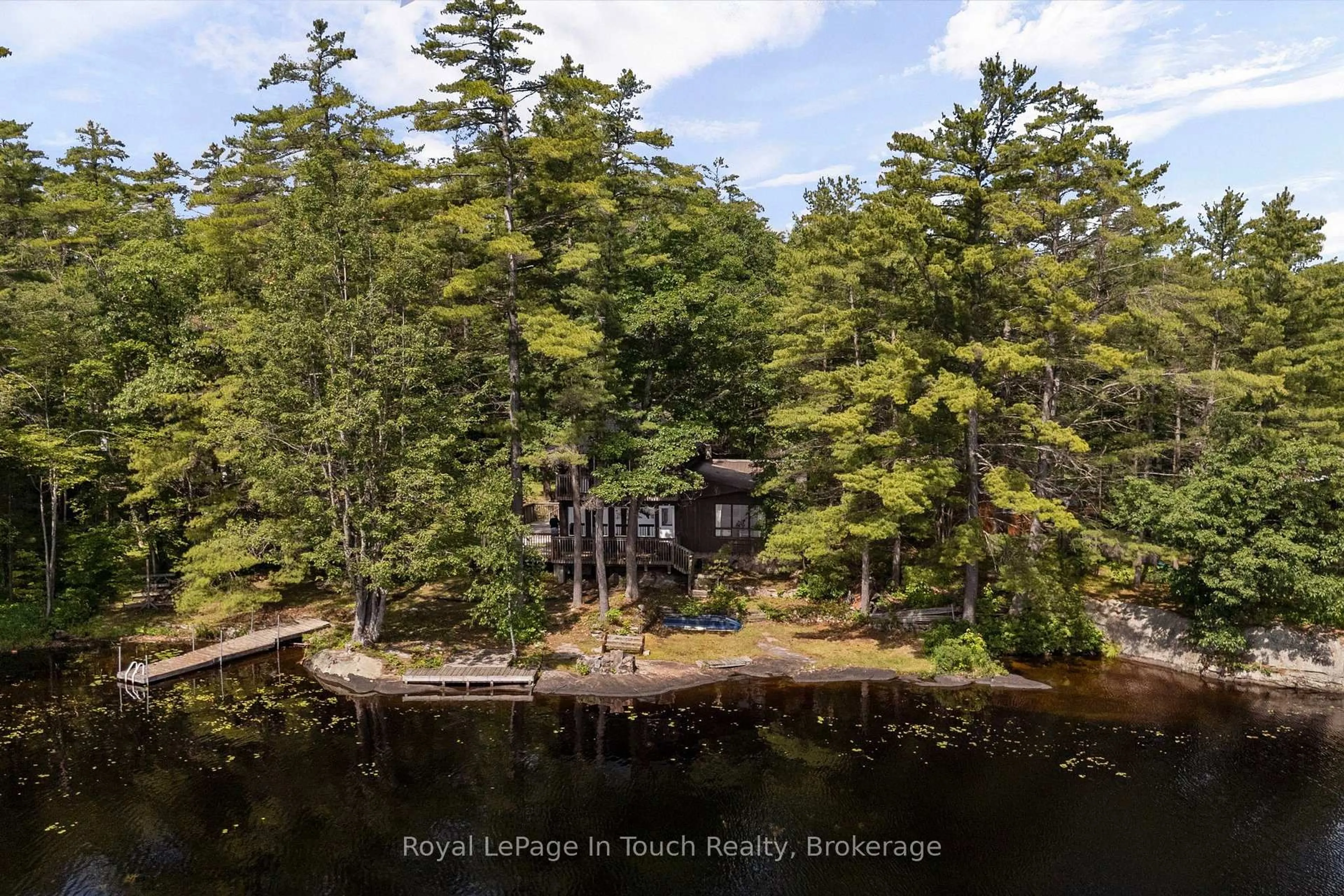 A pic from outside/outdoor area/front of a property/back of a property/a pic from drone, water/lake/river/ocean view for 4169 Lavis Lane, Severn Ontario L0K 1E0