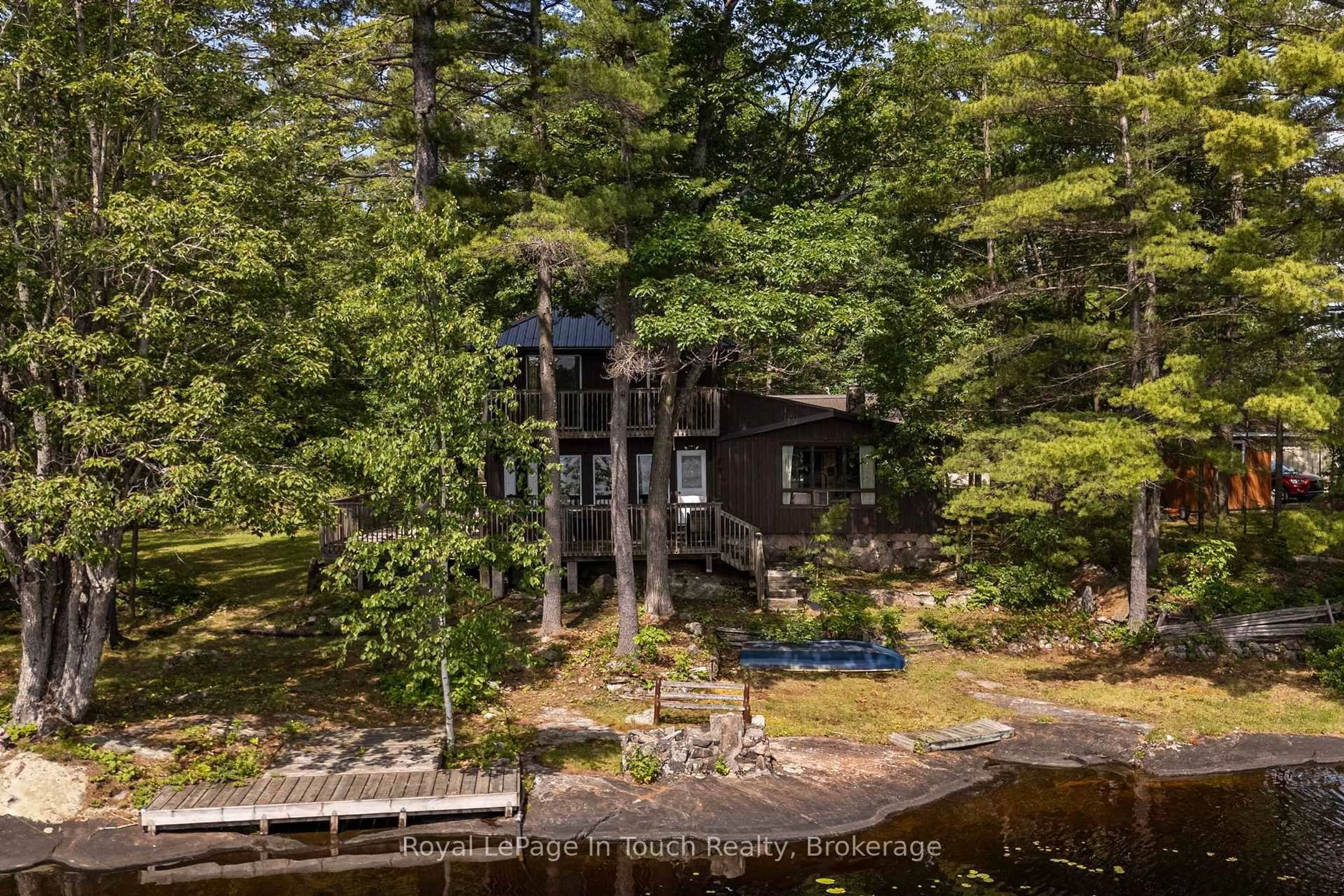 A pic from outside/outdoor area/front of a property/back of a property/a pic from drone, water/lake/river/ocean view for 4169 Lavis Lane, Severn Ontario L0K 1E0