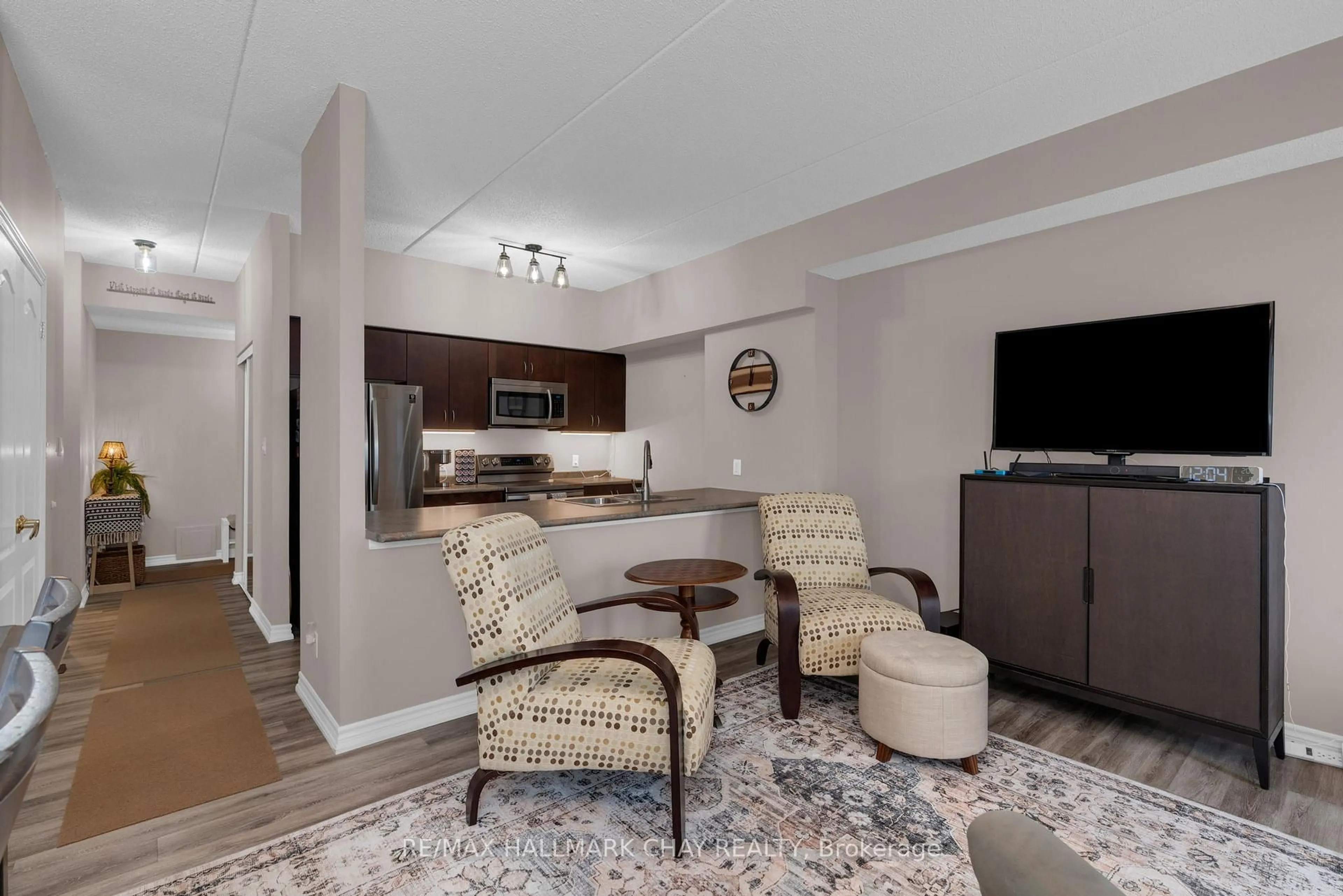 Living room with furniture, unknown for 486 Laclie St #109, Orillia Ontario L3V 4P9