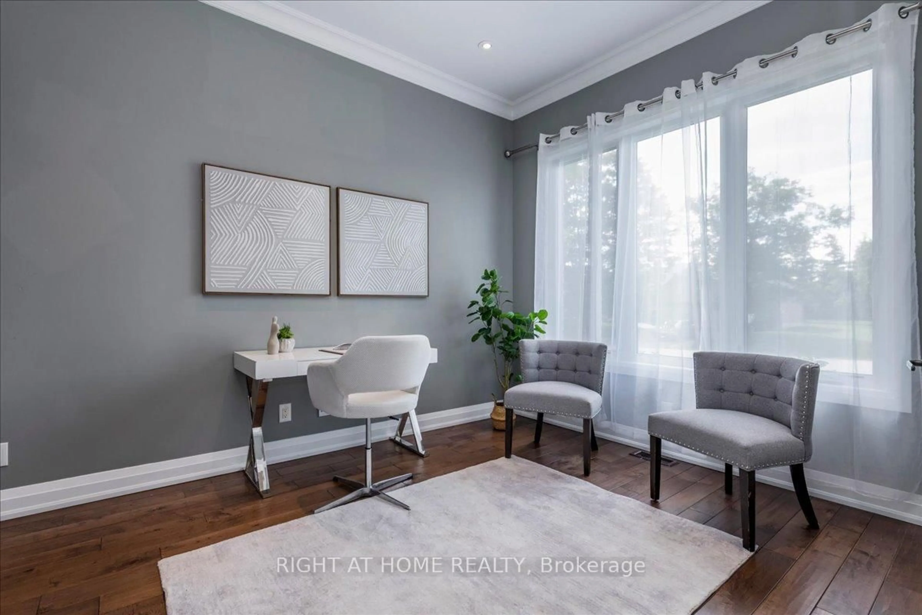 Living room with furniture, wood/laminate floor for 8 Lloyd Cook Dr, Springwater Ontario L0L 1Y3