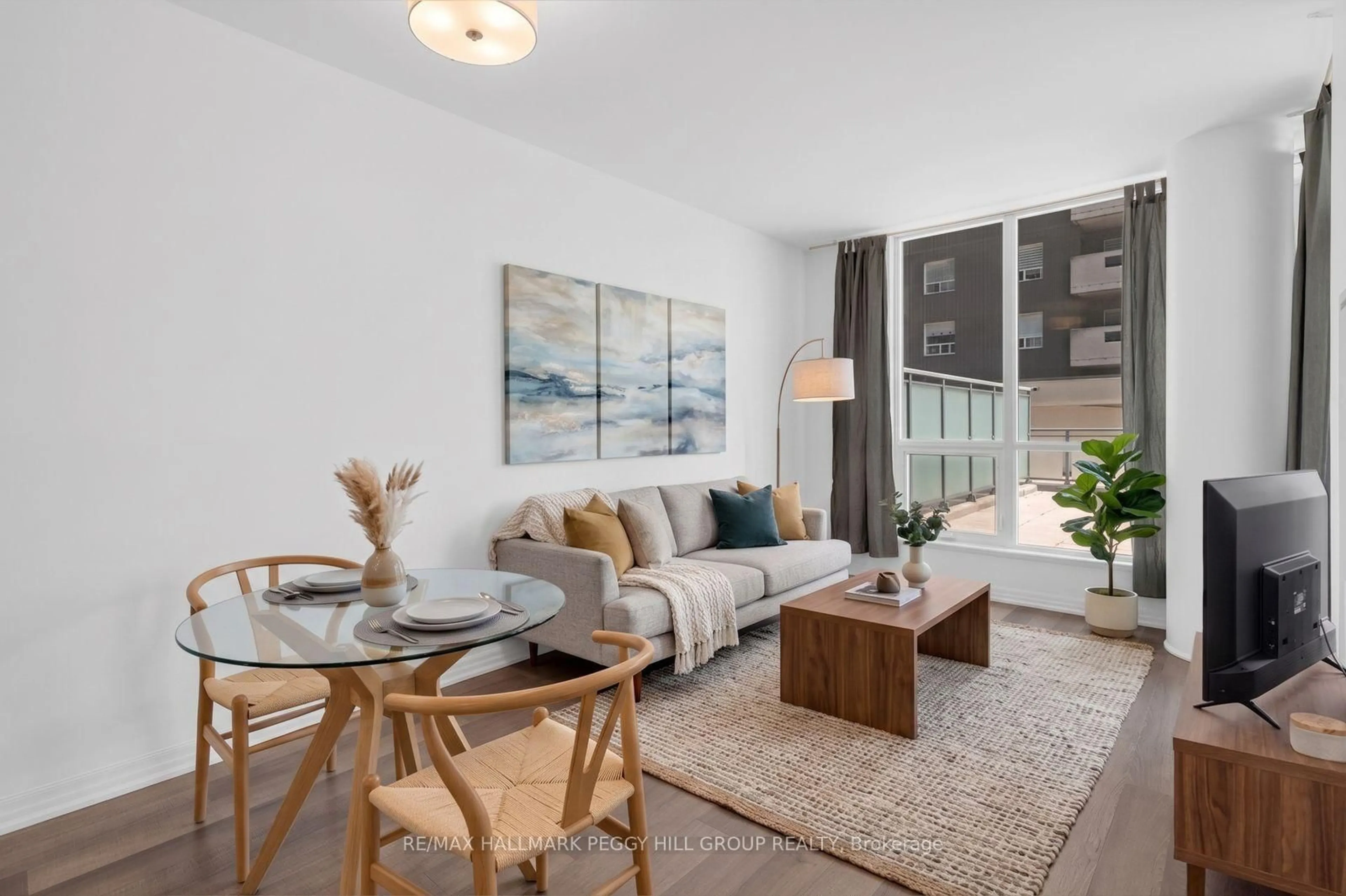 Living room with furniture, unknown for 111 Worsley St #309, Barrie Ontario L4M 0J5