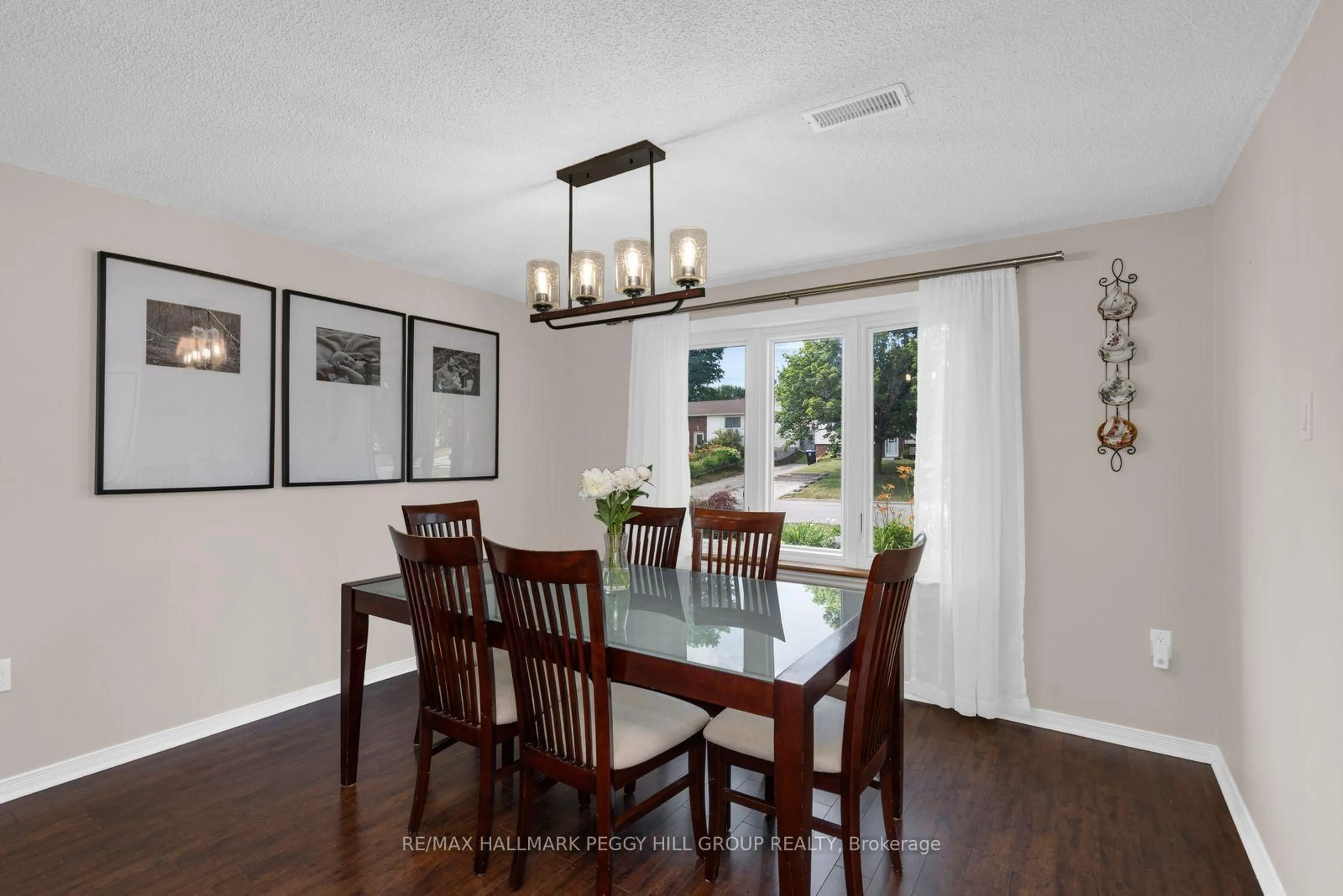 Dining room, wood/laminate floor for 295 Galloway Blvd, Midland Ontario L4R 5A3