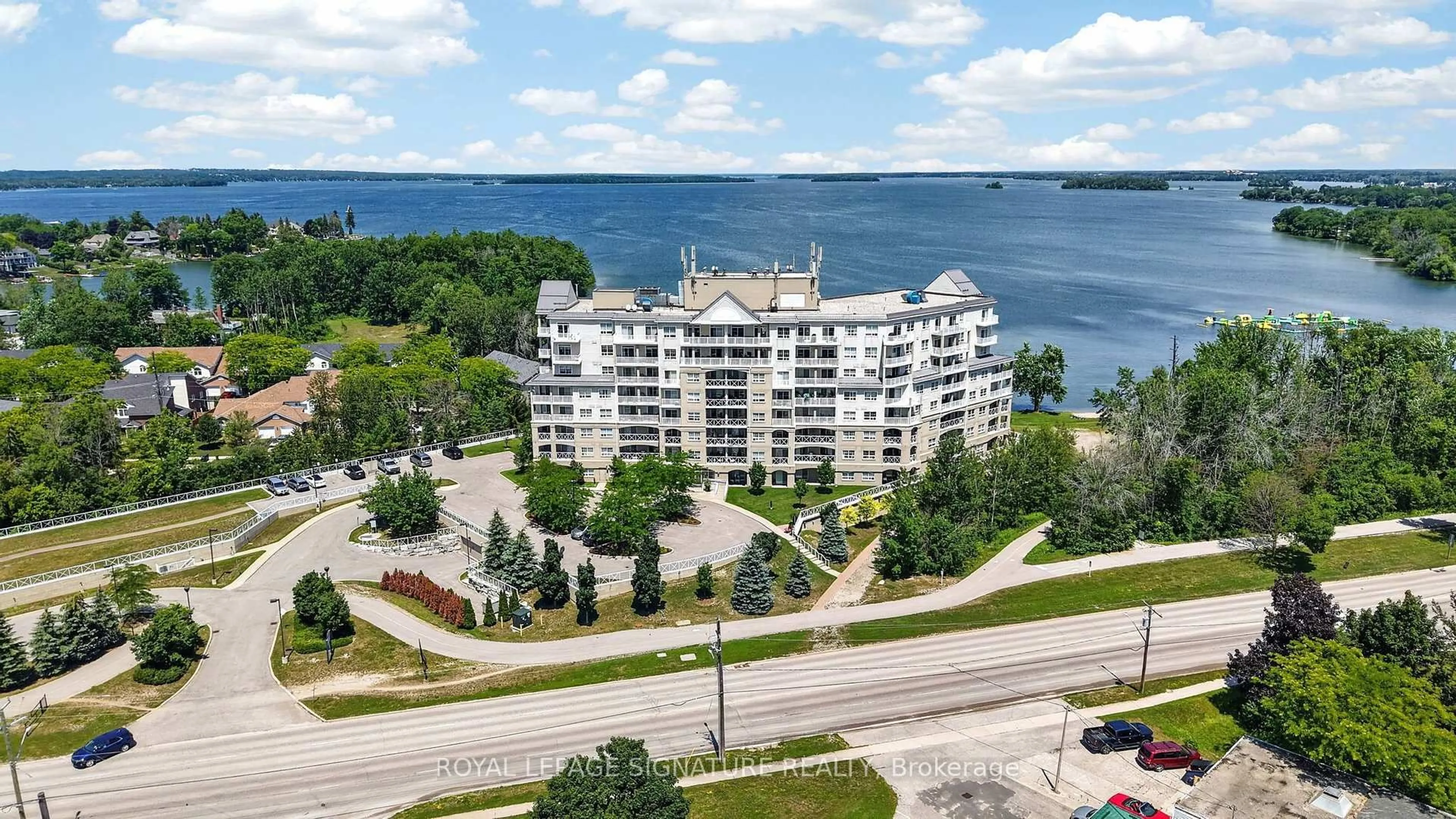 A pic from outside/outdoor area/front of a property/back of a property/a pic from drone, water/lake/river/ocean view for 354 Atherley Rd #605, Orillia Ontario L3V 0B8