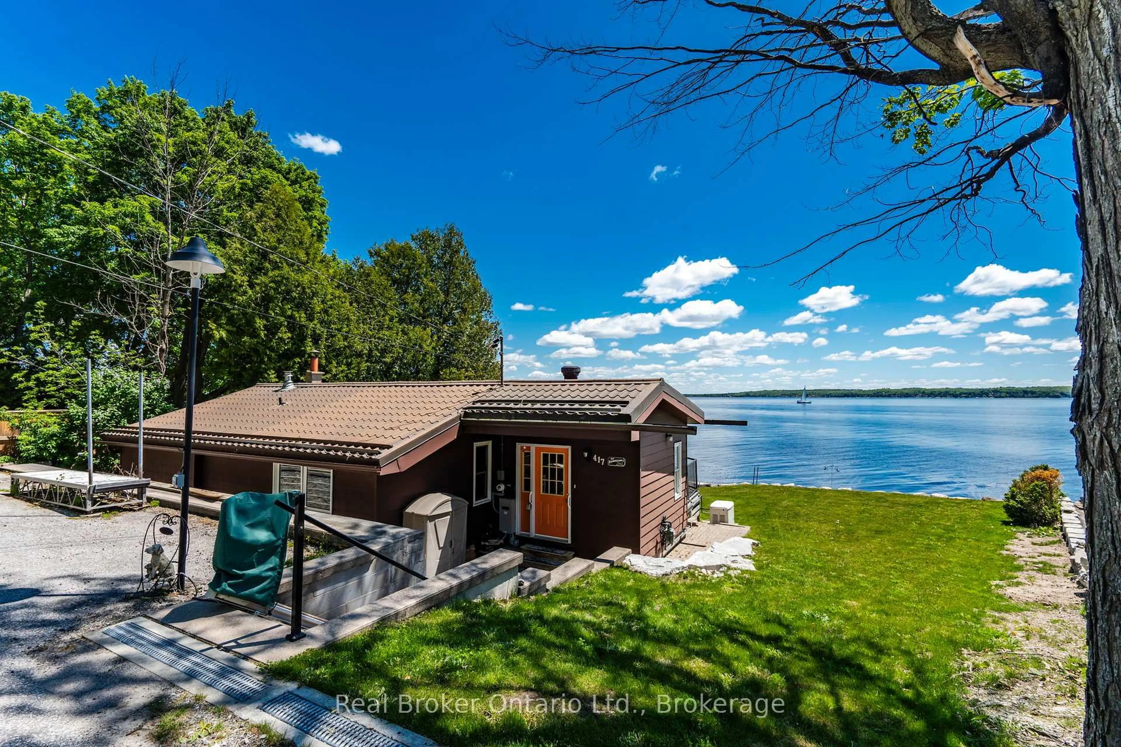 A pic from outside/outdoor area/front of a property/back of a property/a pic from drone, water/lake/river/ocean view for 417 Pheasant Lane, Midland Ontario L4R 5H3