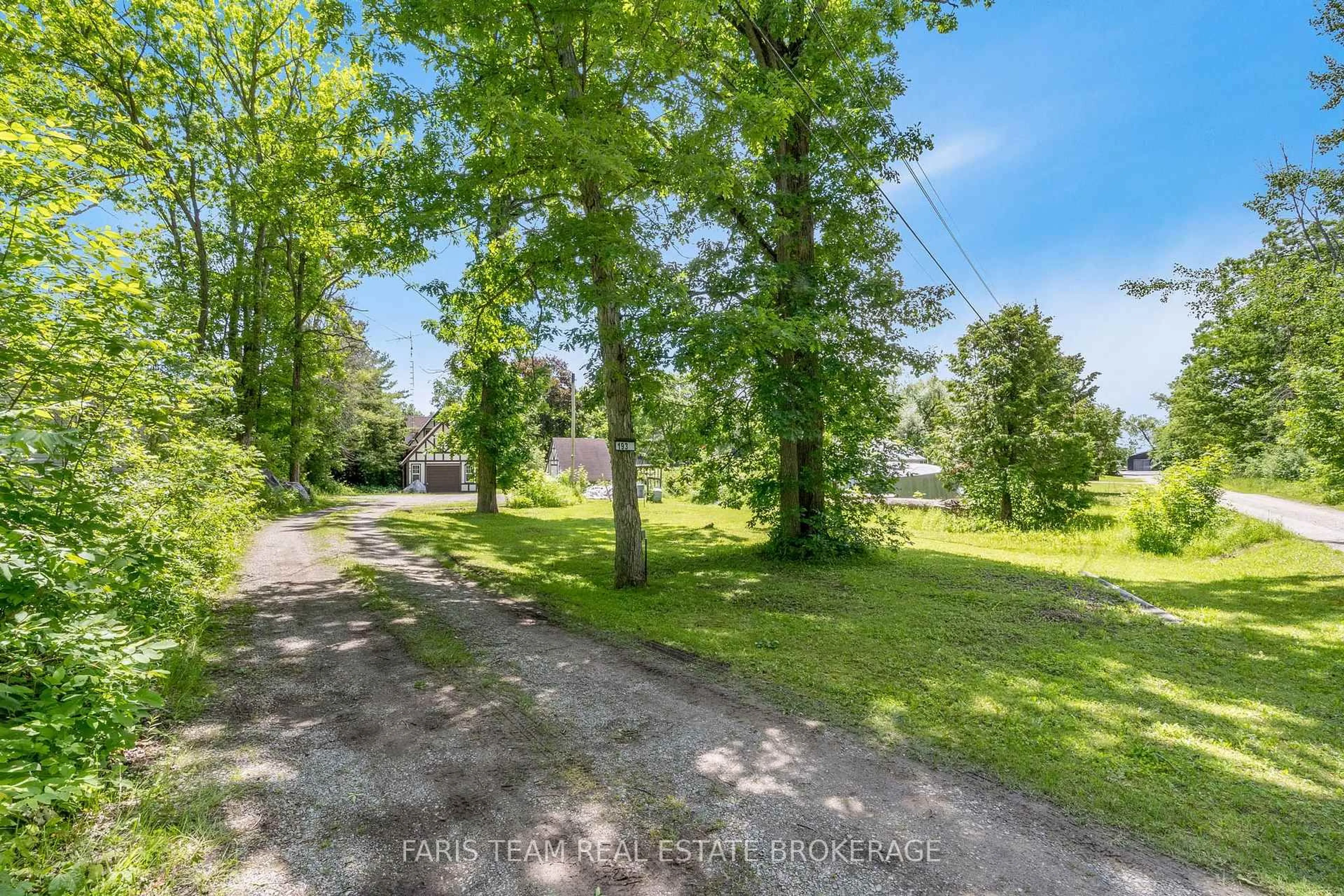 A pic from outside/outdoor area/front of a property/back of a property/a pic from drone, forest/trees view for 193 Gouett St, Tay Ontario L0K 2C0
