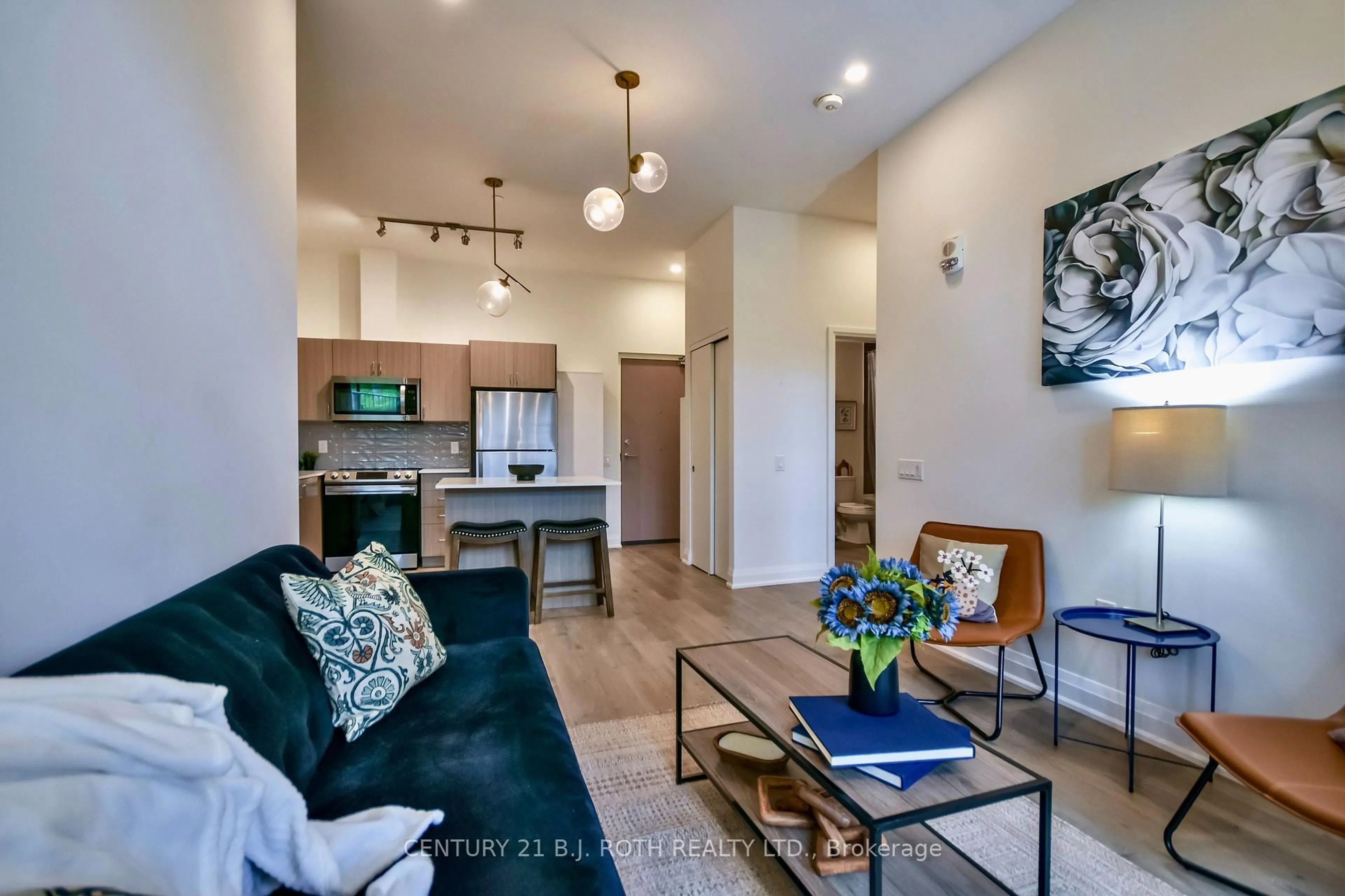 Living room with furniture, unknown for 58 Lakeside Terr #112, Barrie Ontario L4M 0L5