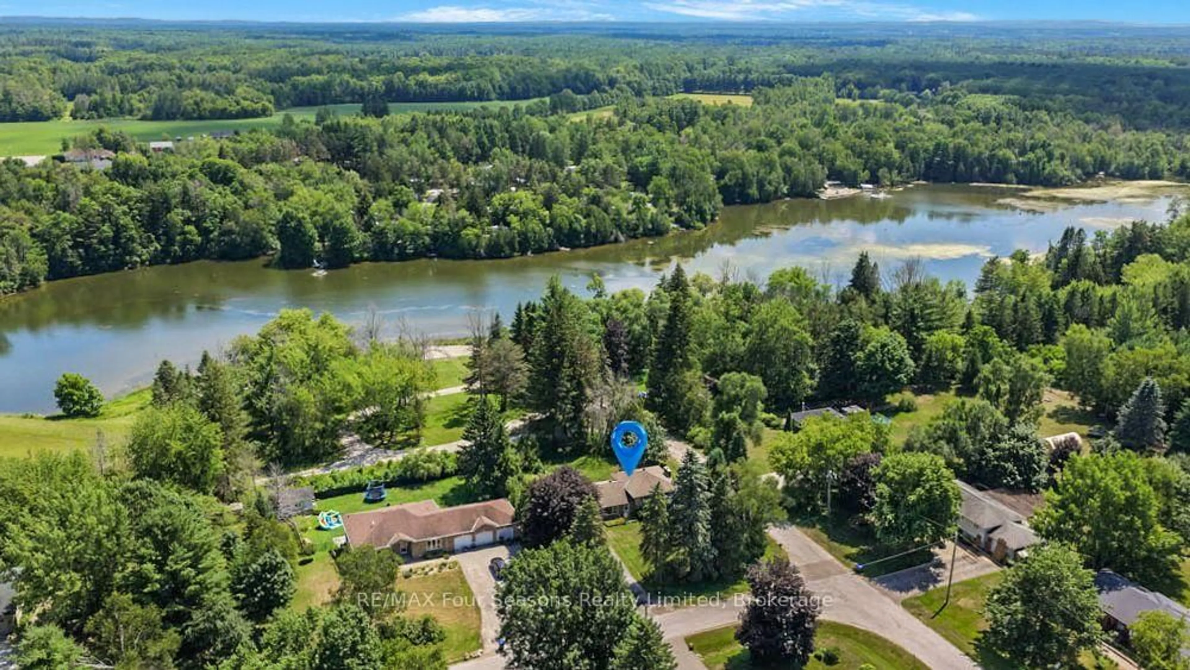 A pic from outside/outdoor area/front of a property/back of a property/a pic from drone, water/lake/river/ocean view for 1 Elgin St, Clearview Ontario L0M 1N0