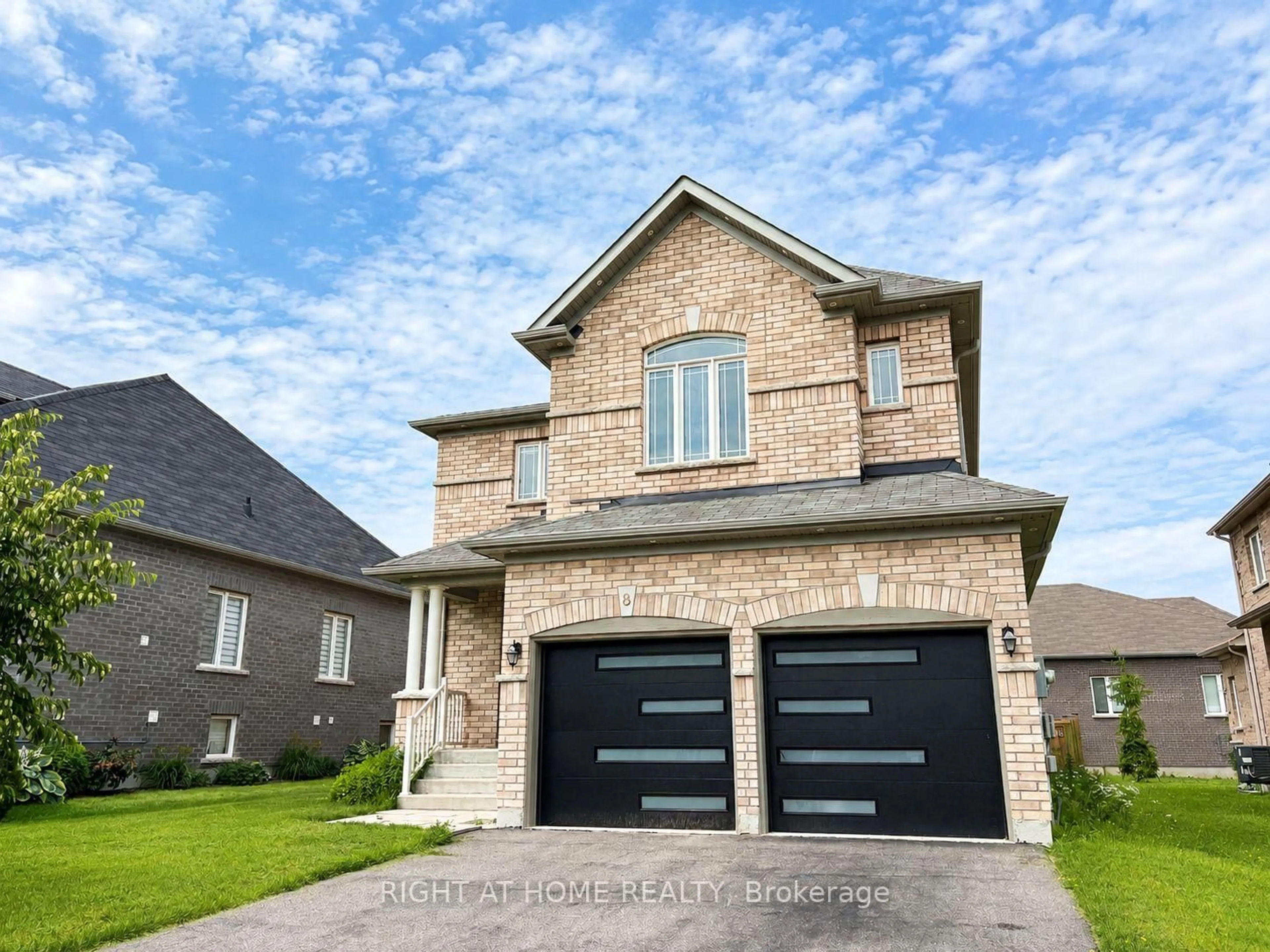 Home with brick exterior material, street for 8 Pearl St, Wasaga Beach Ontario L9Z 0G9