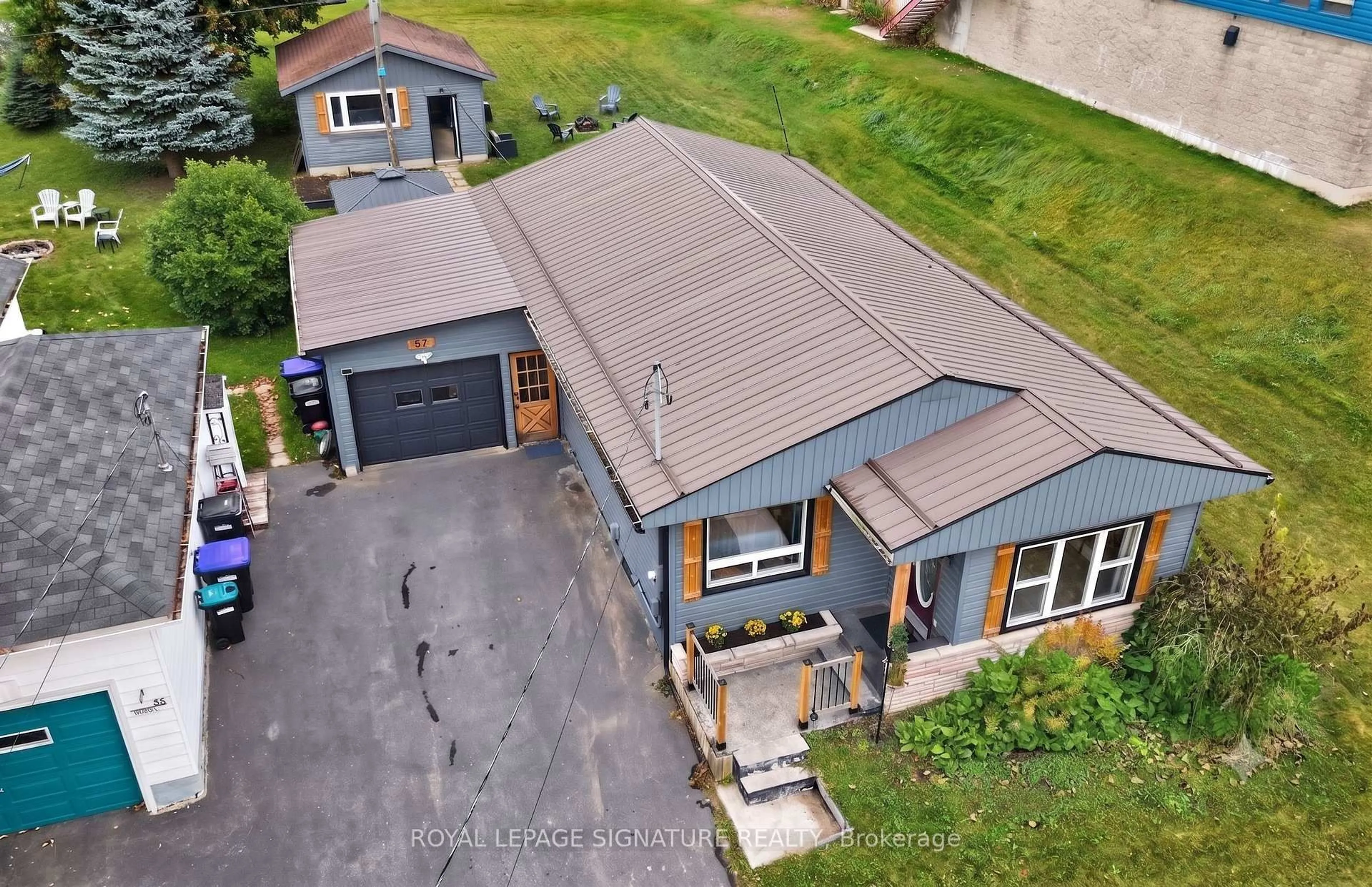 A pic from outside/outdoor area/front of a property/back of a property/a pic from drone, street for 57 Maria St, Penetanguishene Ontario L9M 1L3