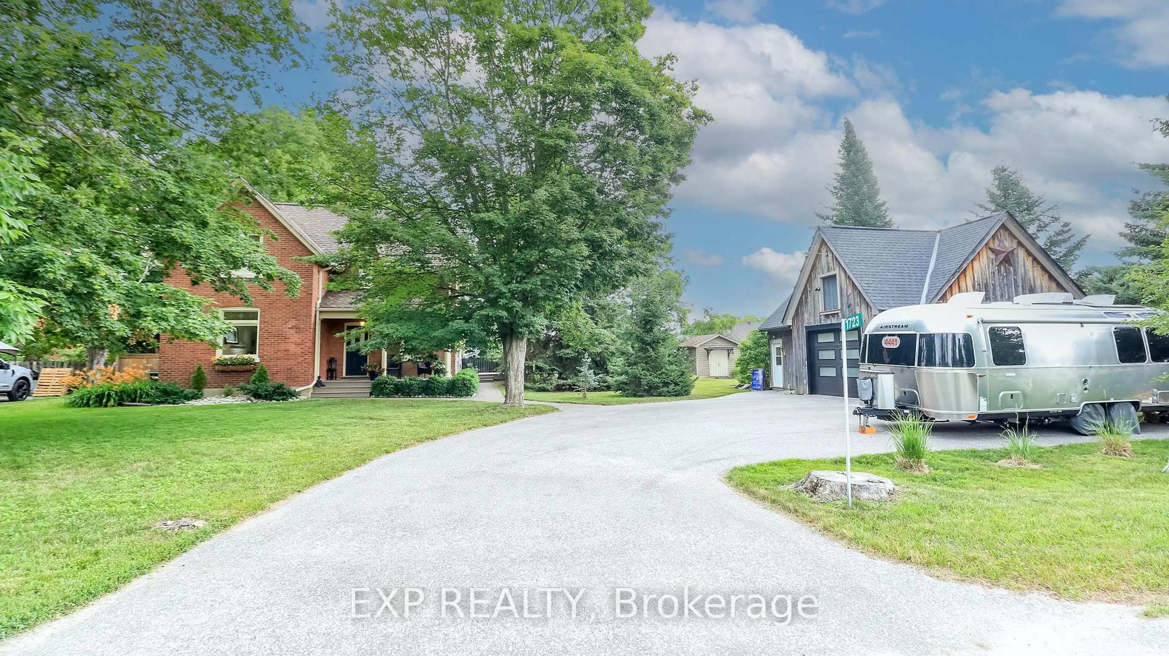 A pic from outside/outdoor area/front of a property/back of a property/a pic from drone, street for 1723 George Johnston Rd, Springwater Ontario L0L 1Y0