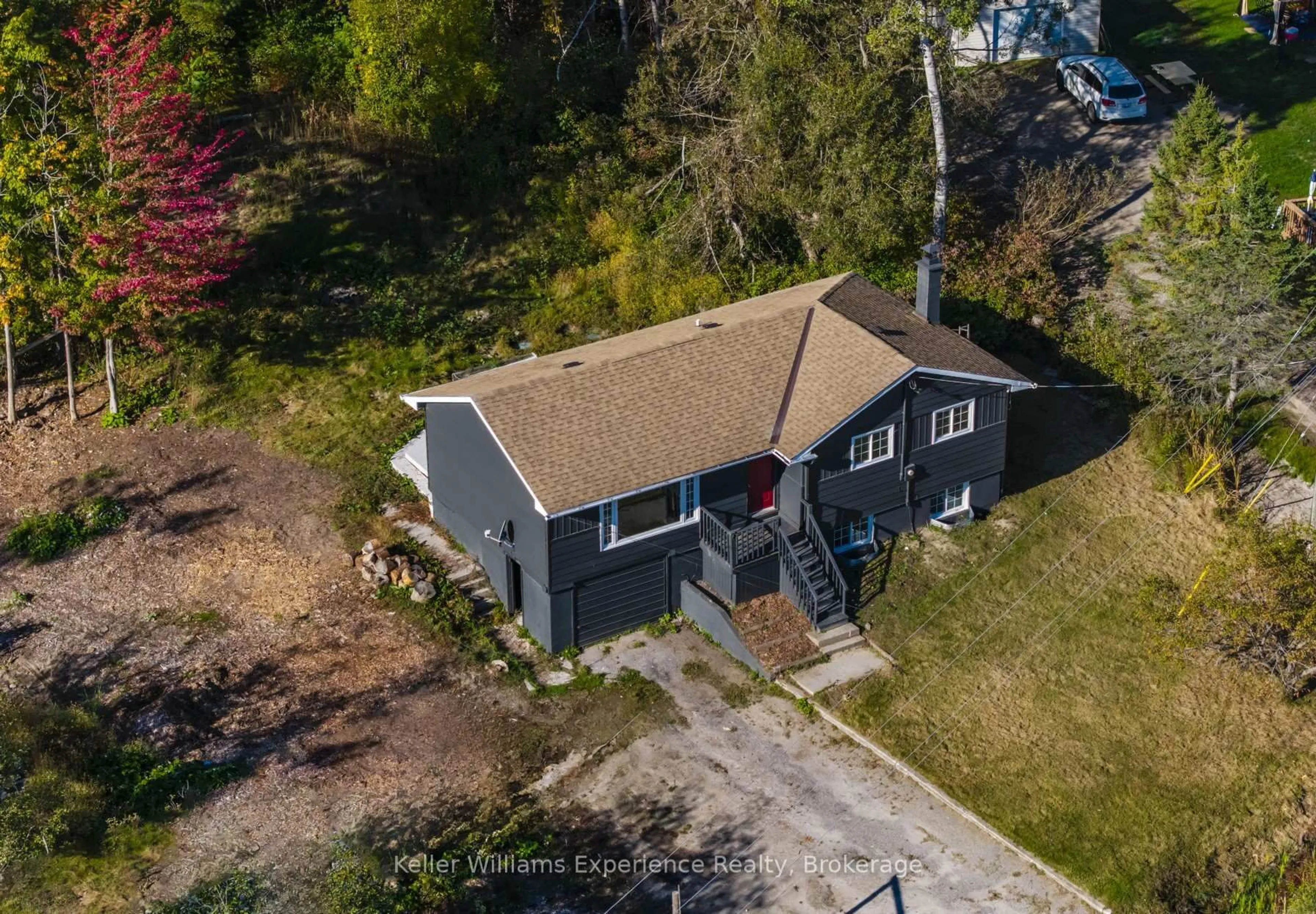 A pic from outside/outdoor area/front of a property/back of a property/a pic from drone, unknown for 556 Champlain Rd, Tiny Ontario L9M 0C2