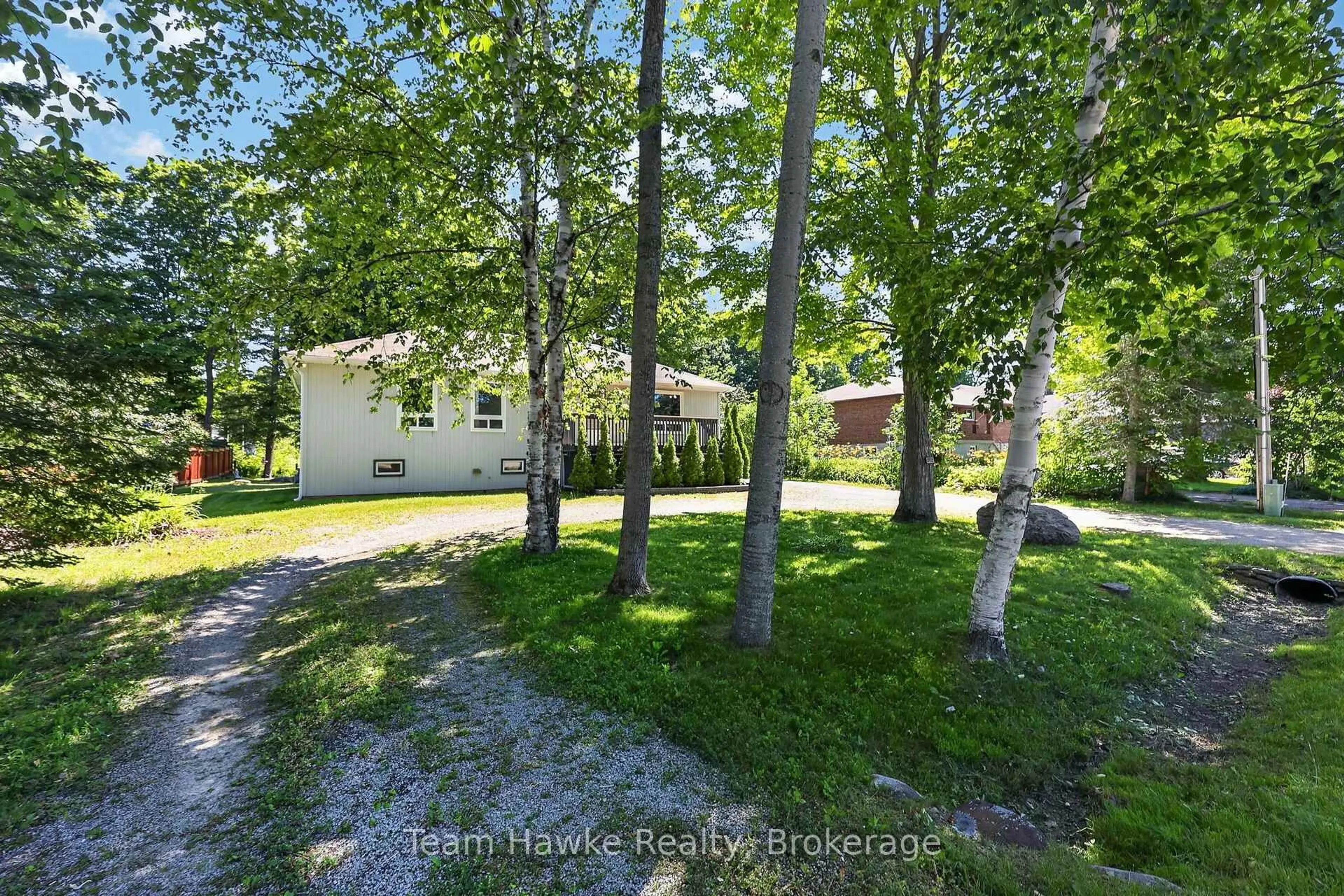 A pic from outside/outdoor area/front of a property/back of a property/a pic from drone, forest/trees view for 37 Bellehumeur Rd, Tiny Ontario L9M 0J1