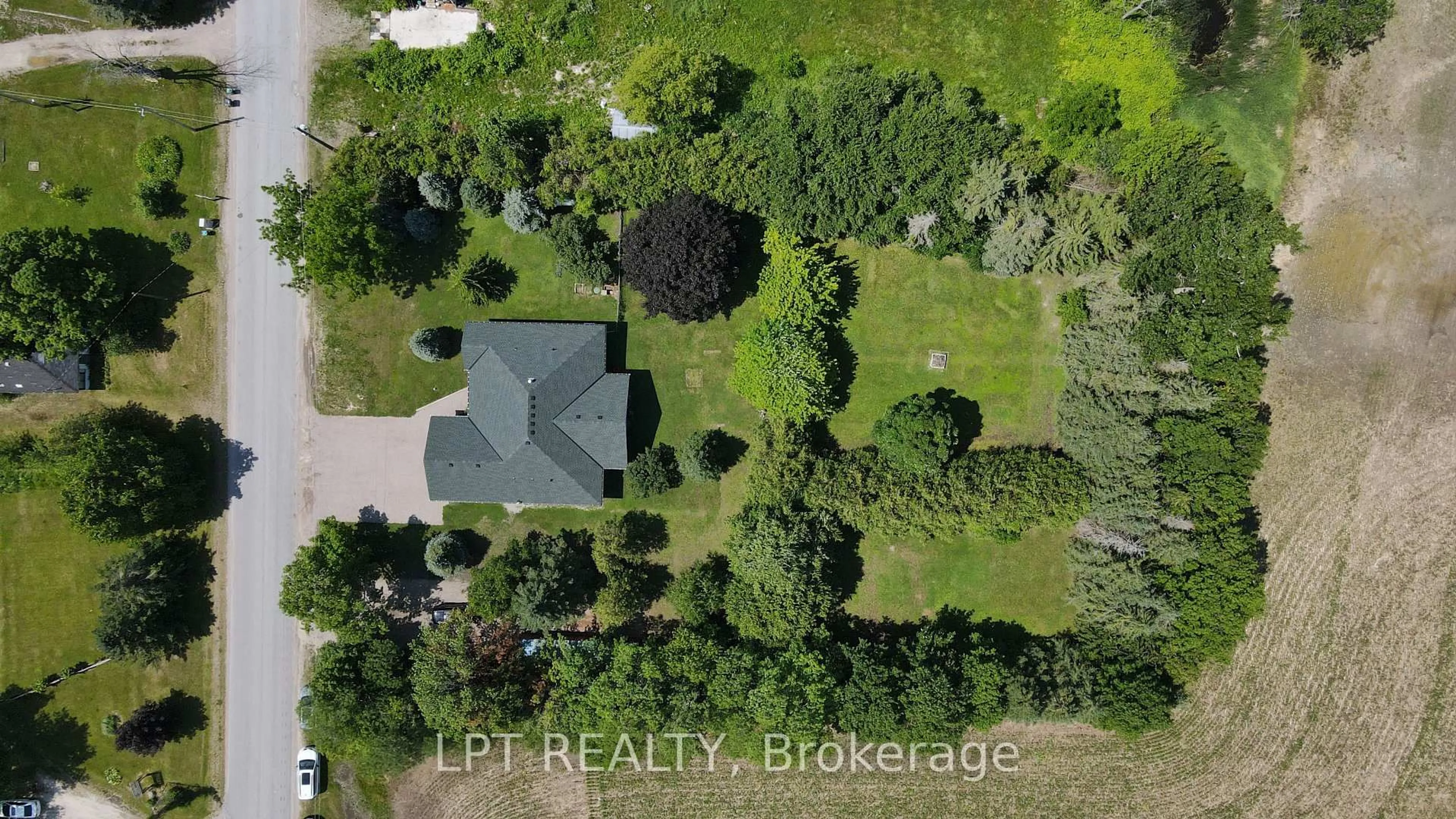 A pic from outside/outdoor area/front of a property/back of a property/a pic from drone, street for 3265 Vigo Rd, Springwater Ontario L0L 1P0