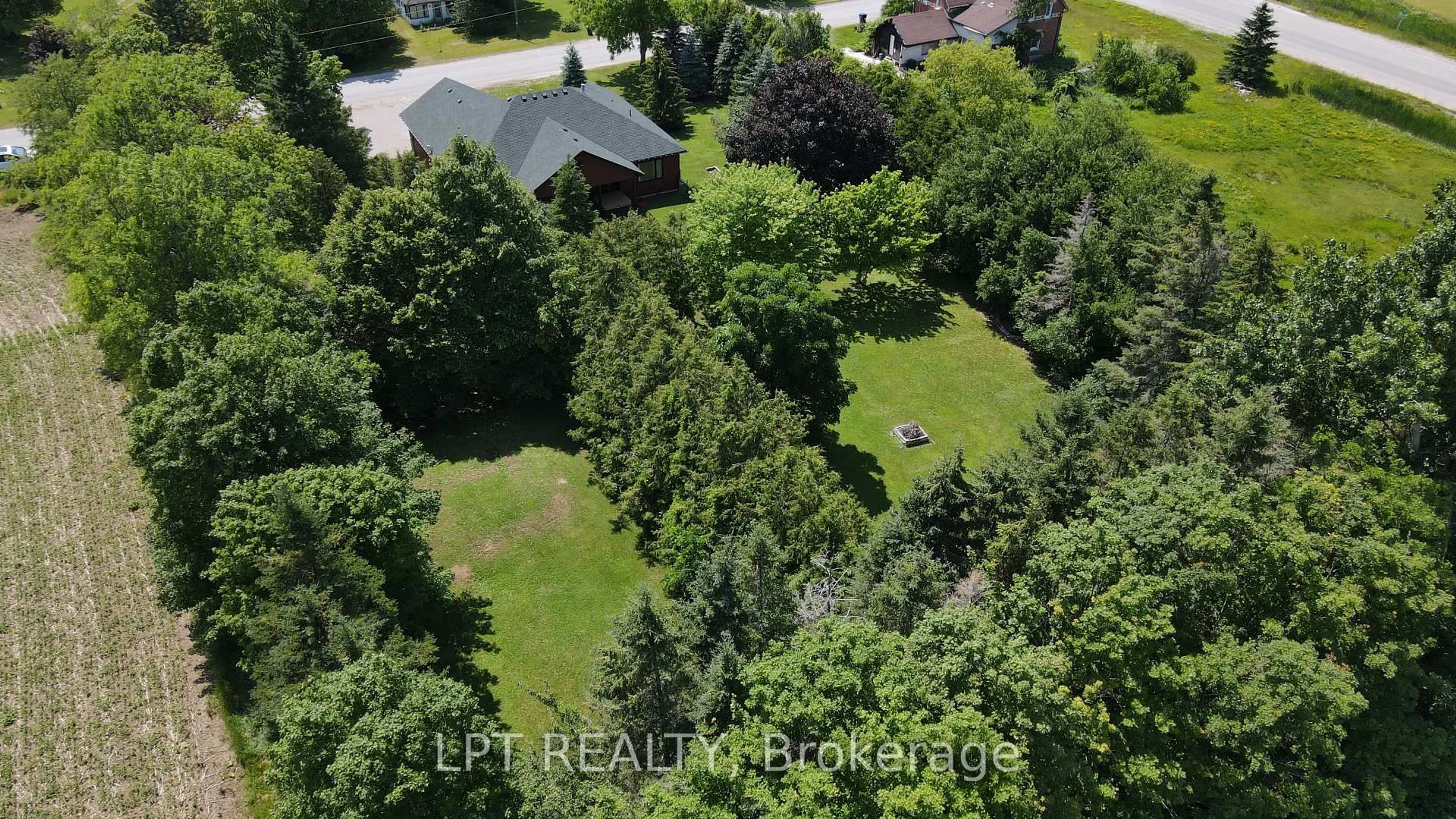 A pic from outside/outdoor area/front of a property/back of a property/a pic from drone, forest/trees view for 3265 Vigo Rd, Springwater Ontario L0L 1P0