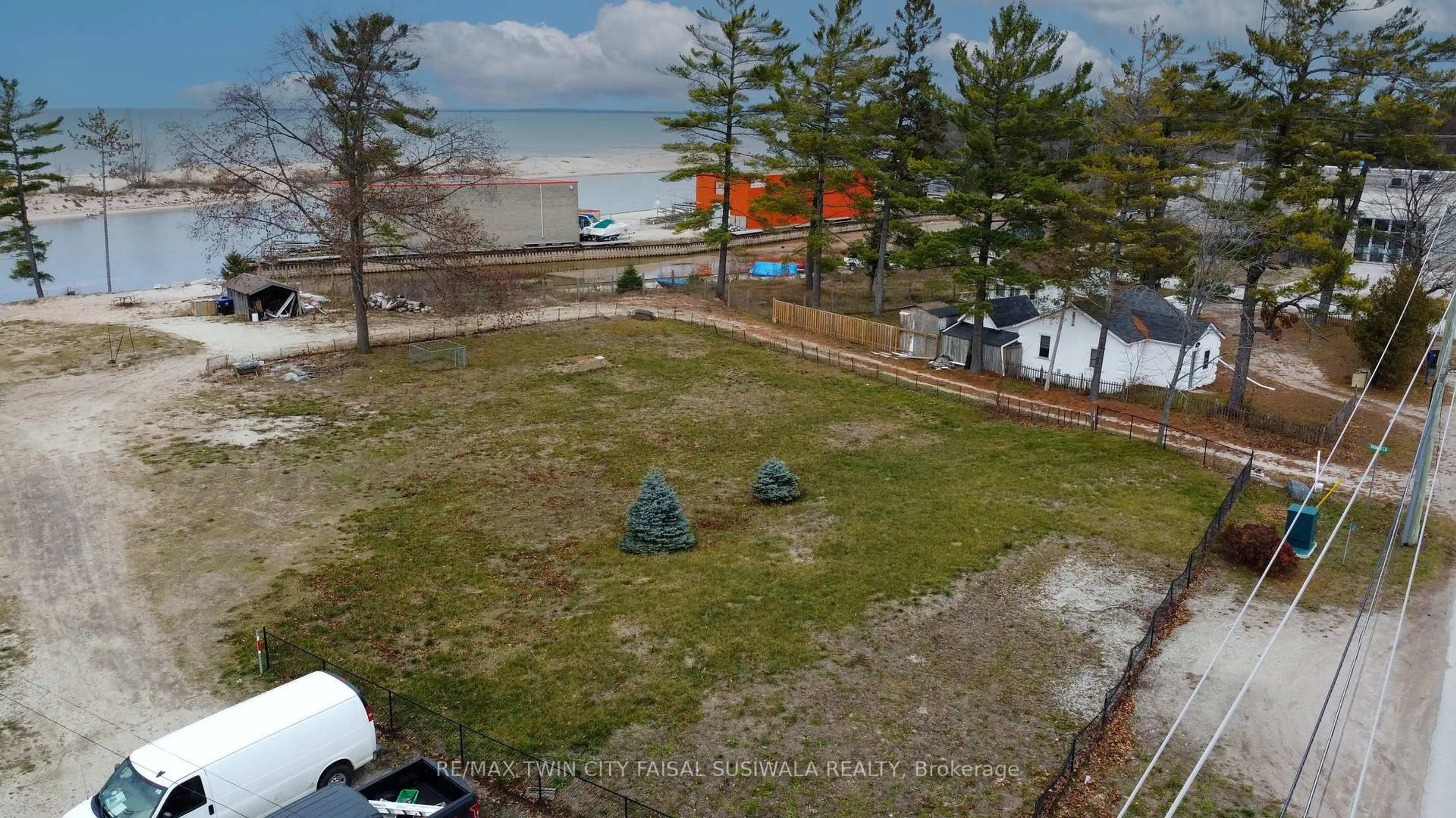 A pic from outside/outdoor area/front of a property/back of a property/a pic from drone, water/lake/river/ocean view for 326 RIVER Rd #A, Wasaga Beach Ontario L3B 5N6