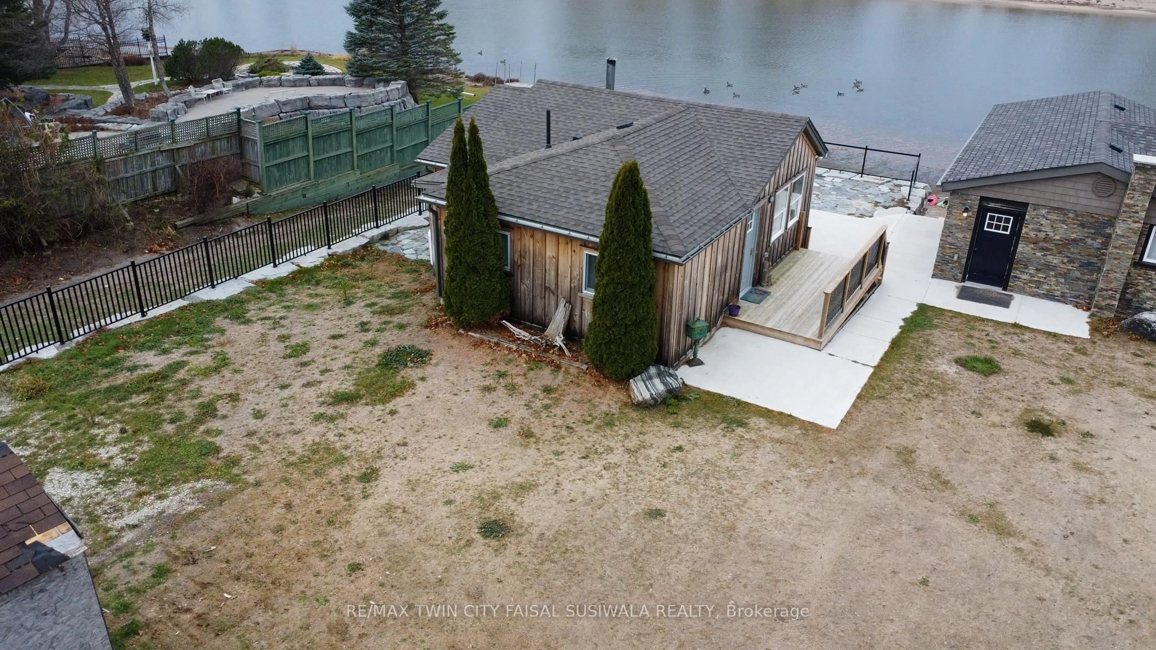 A pic from outside/outdoor area/front of a property/back of a property/a pic from drone, water/lake/river/ocean view for 2 BROWNS Lane, Wasaga Beach Ontario L9Z 2L7